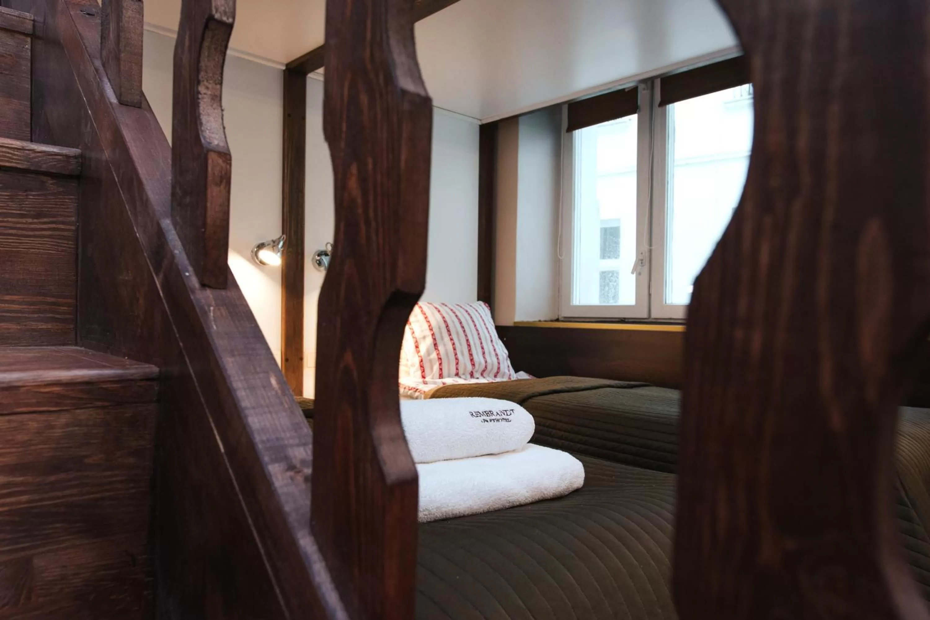 Bed in Rembrandt Aparthotel