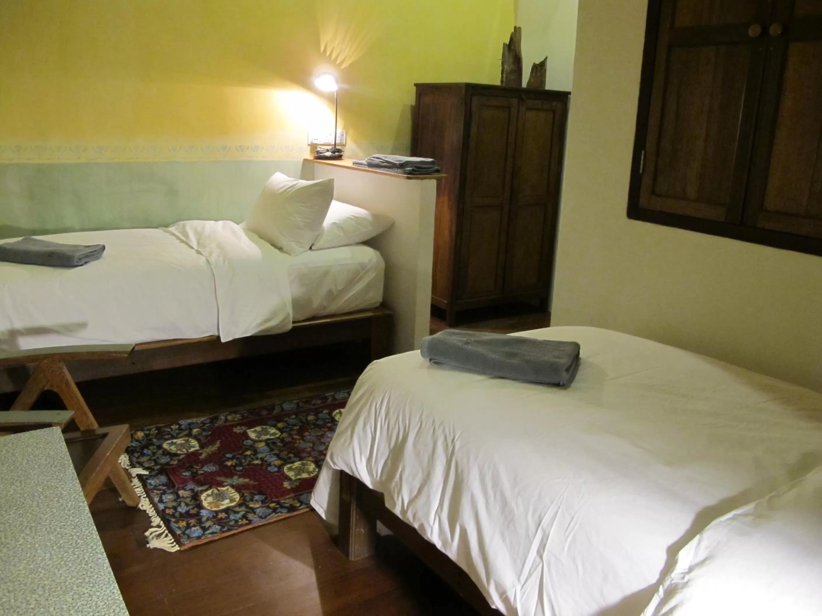 Bed in Ren I Tang Heritage Inn