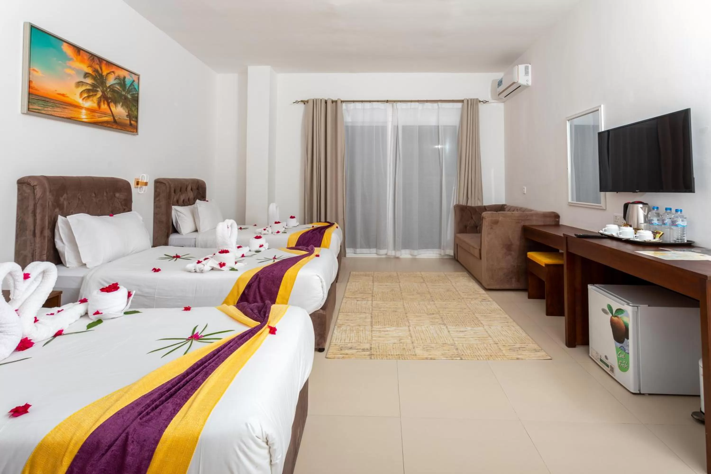 Living room, TV/Entertainment Center in Canary Nungwi Hotel & Free SPA