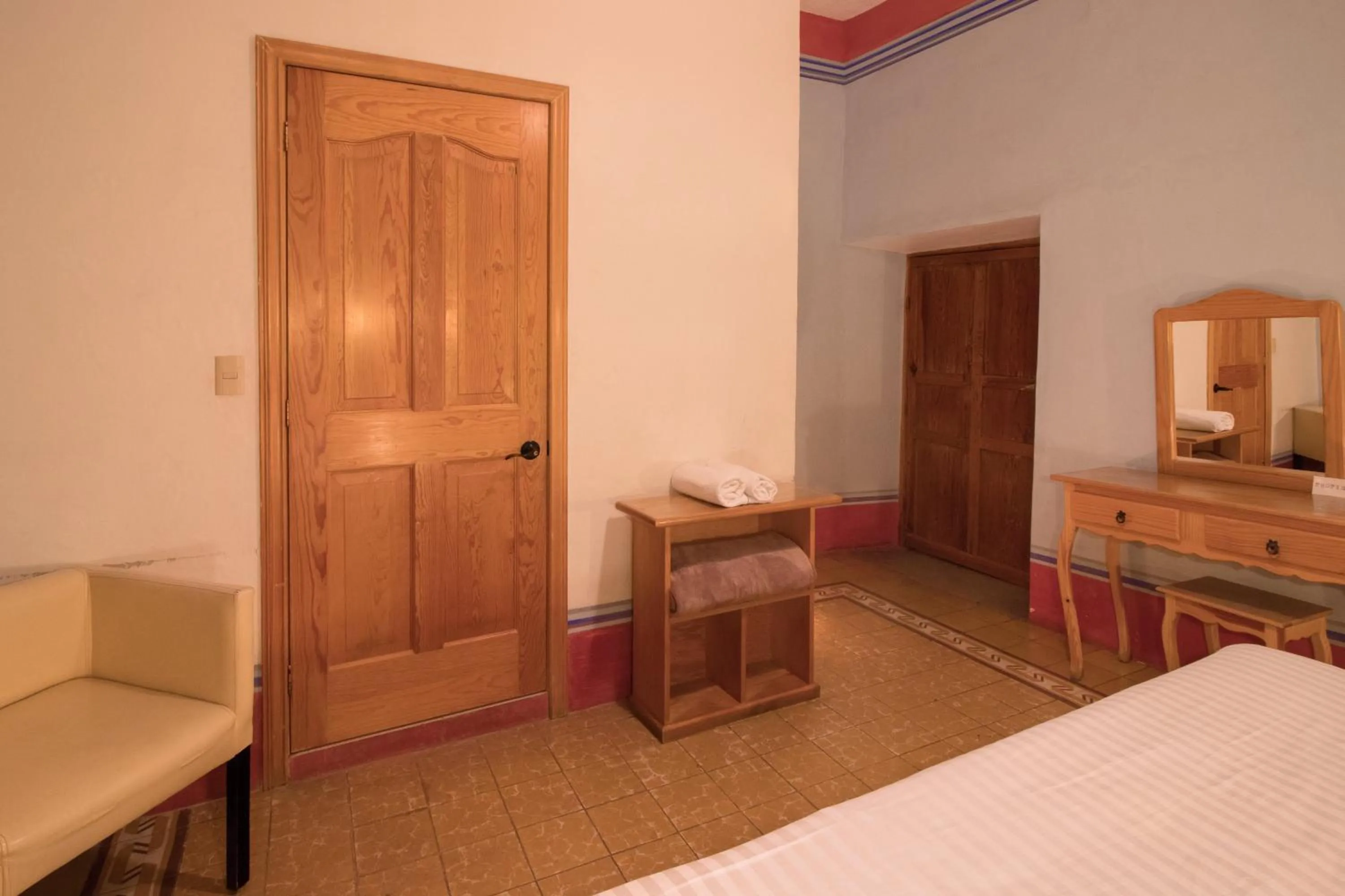 Bed in Hotel Meson Cuevano