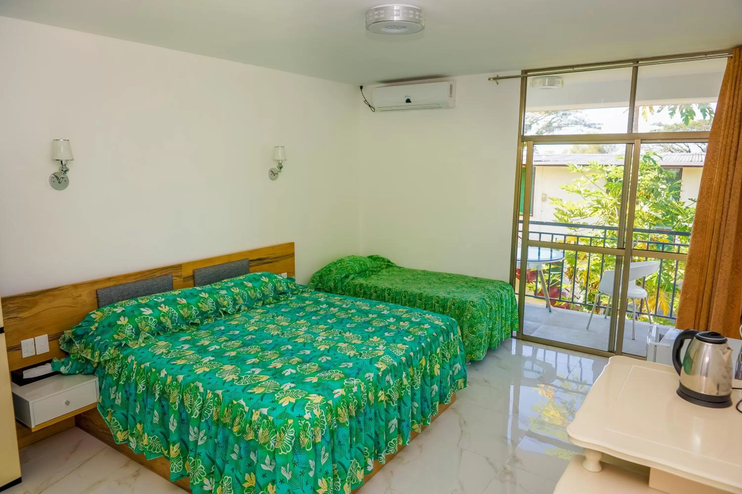 Bed in Lynn's Getaway Hotel