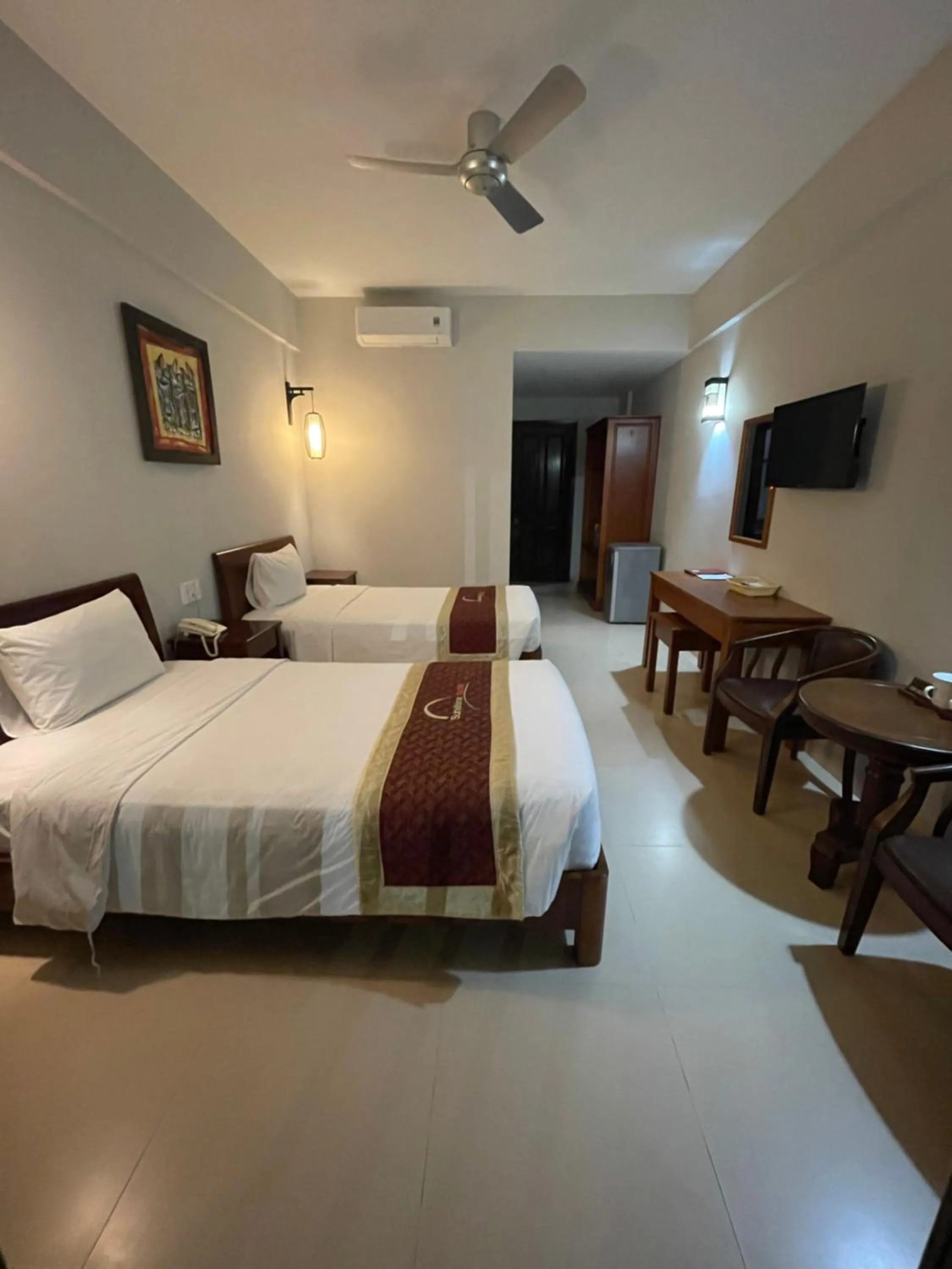 Bed in Sunshine Hoian Hotel