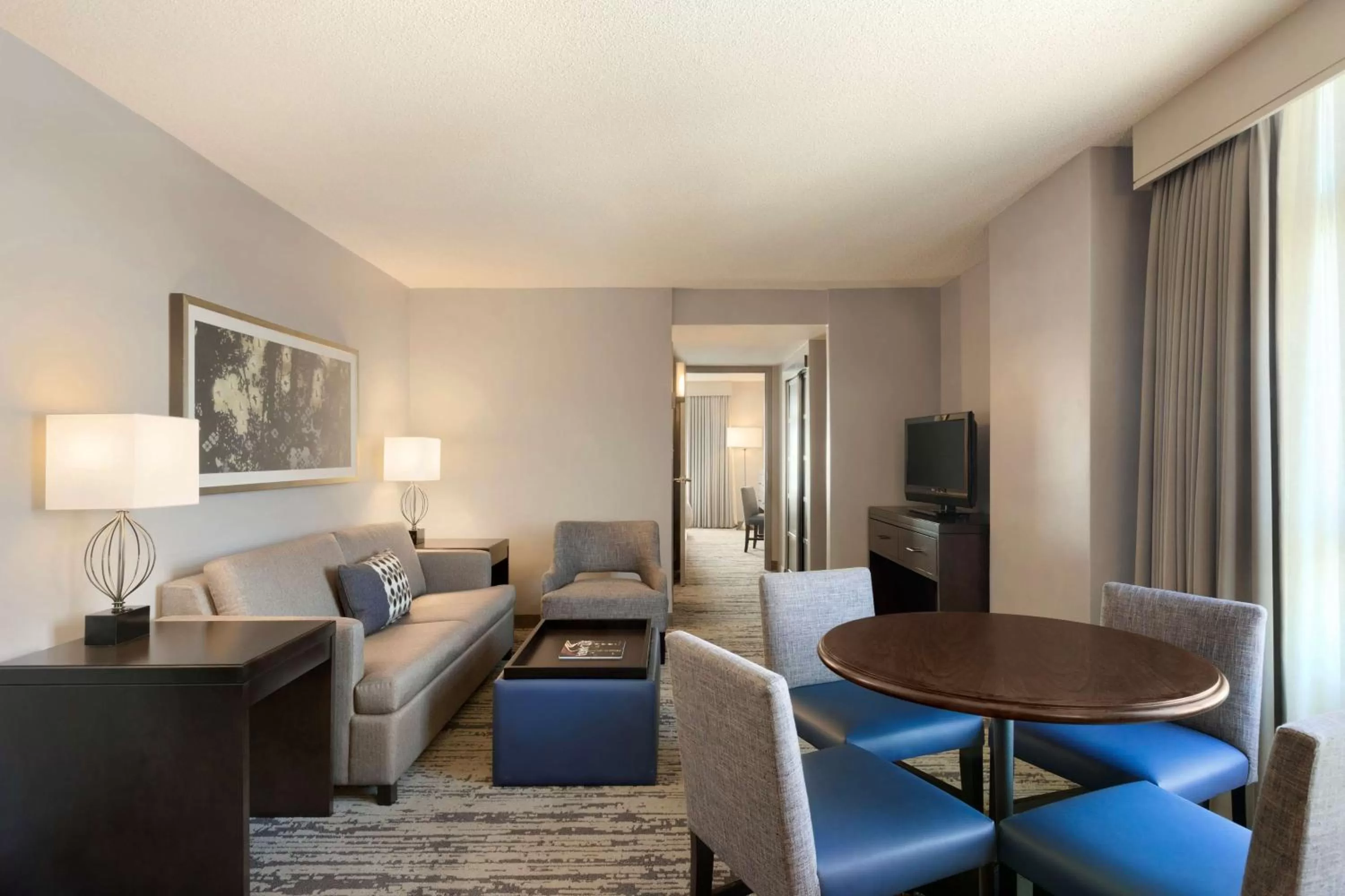 Living room in Embassy Suites by Hilton Atlanta at Centennial Olympic Park
