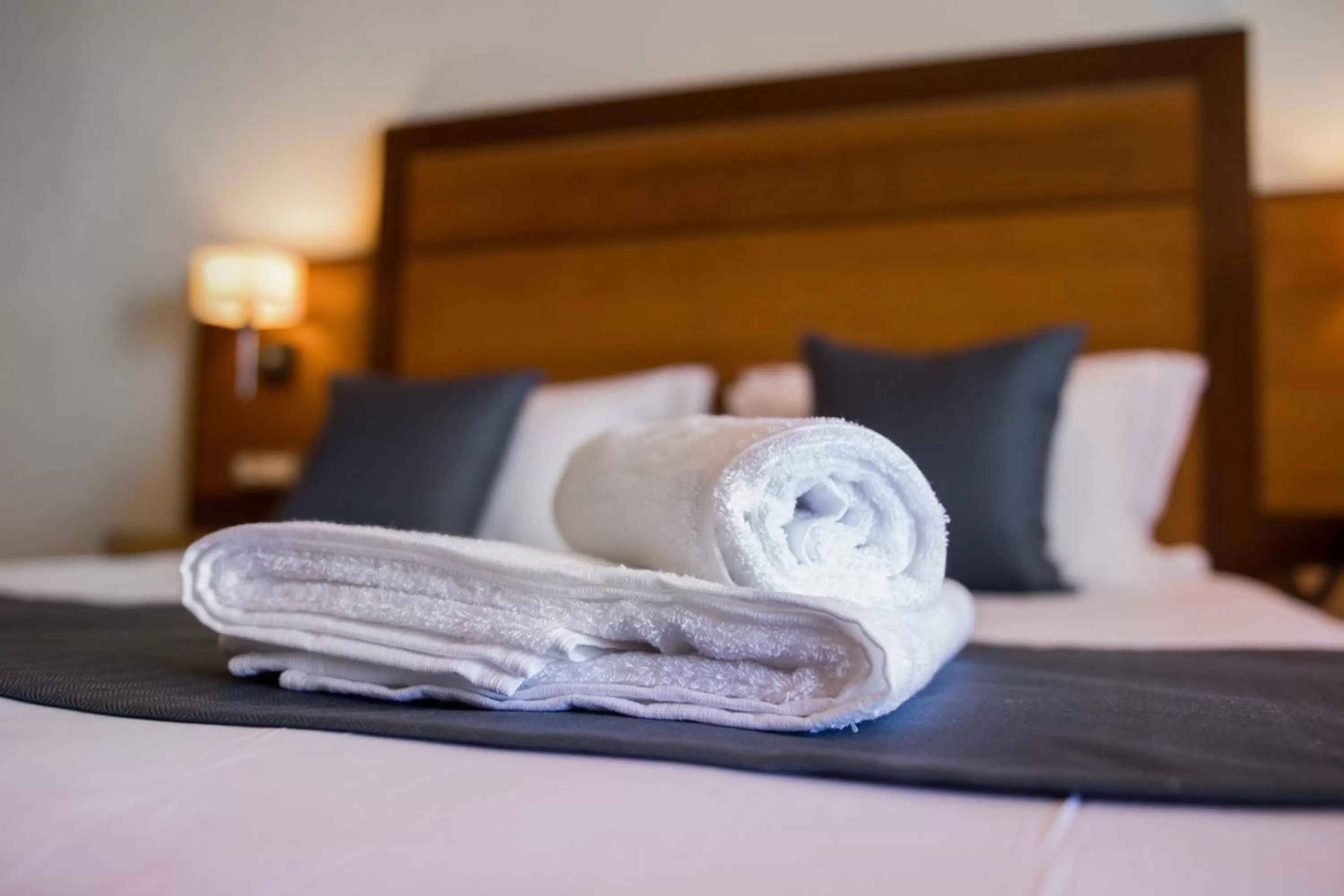 Bed in Manousos City Hotel