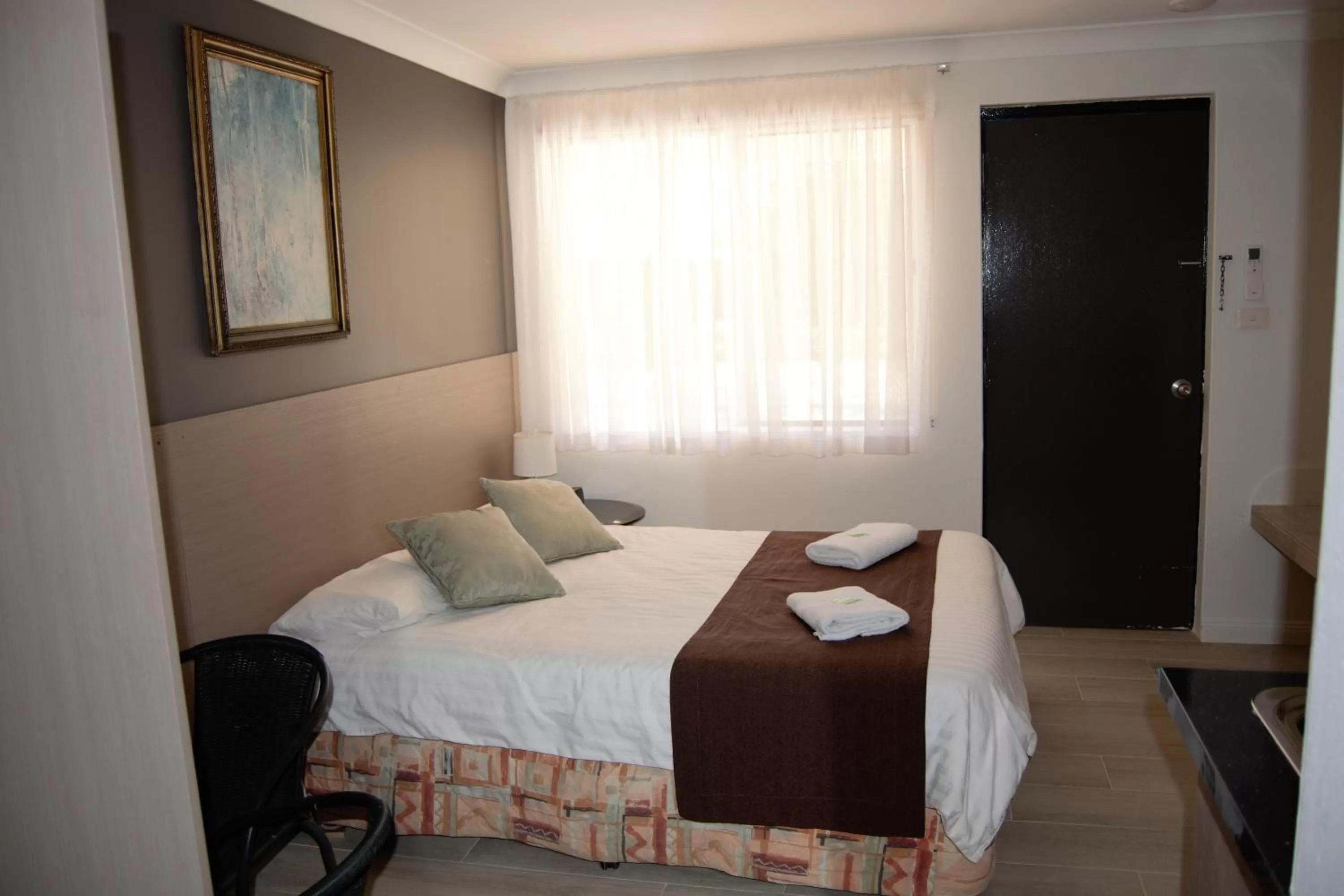 Bed in Civic Motor Inn