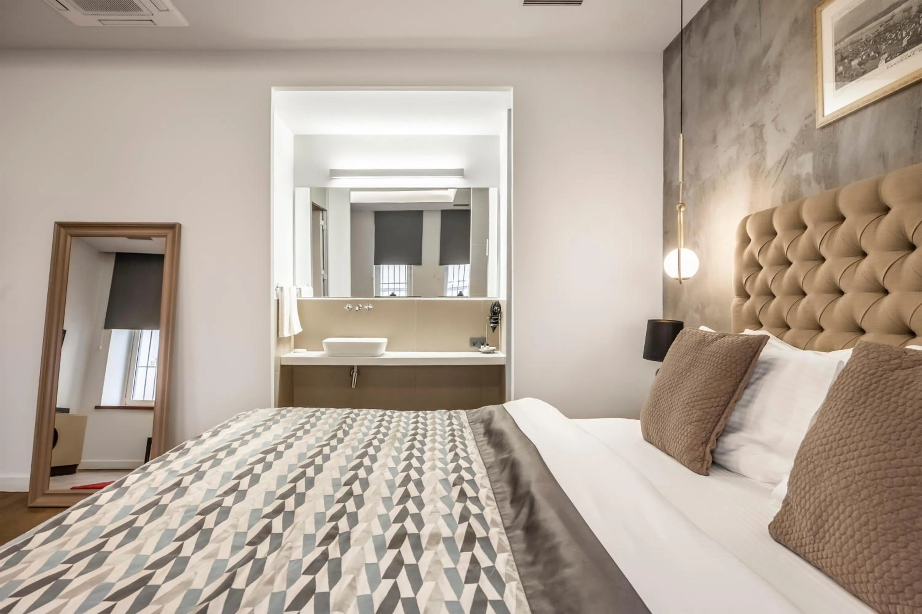 Bed in Ansen Hotel and Suites