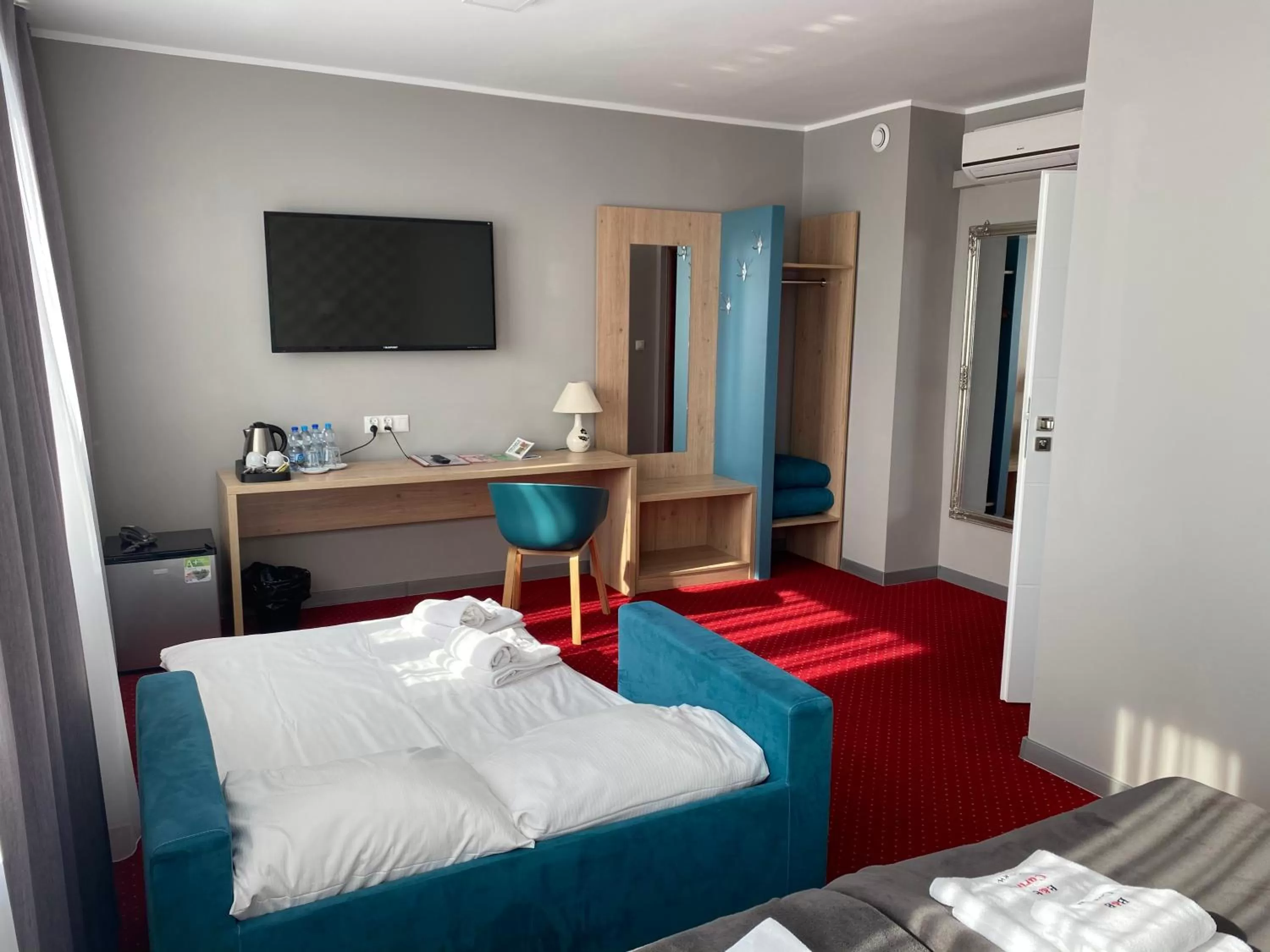 Photo of the whole room, Bed in Carina Hotel