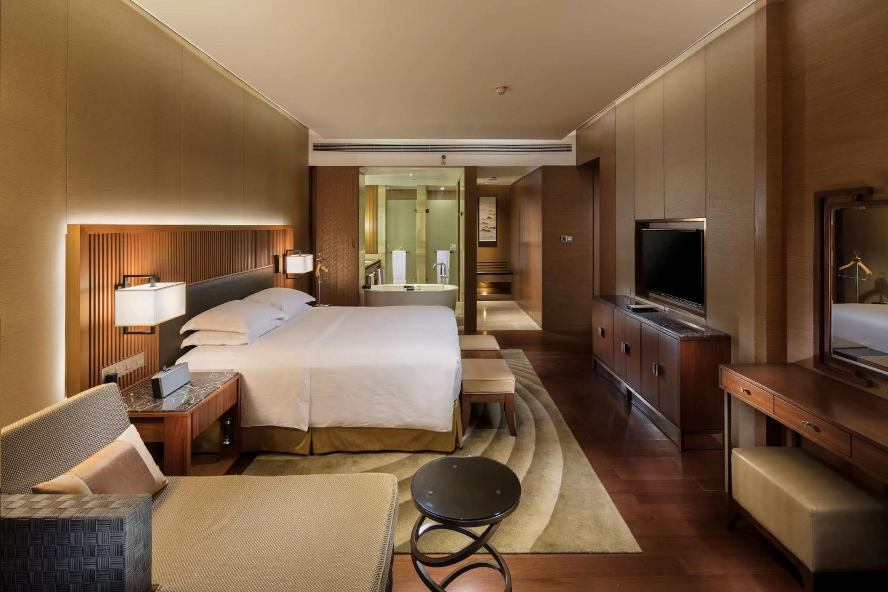Living room, Bed in Hilton Wuhan Optics Valley