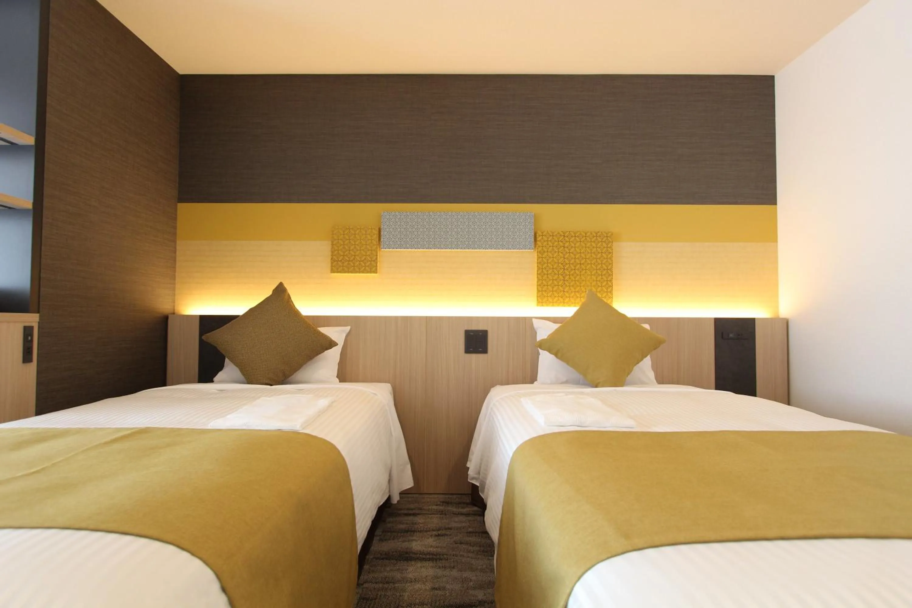 Bed in KOKO HOTEL Tsukiji Ginza