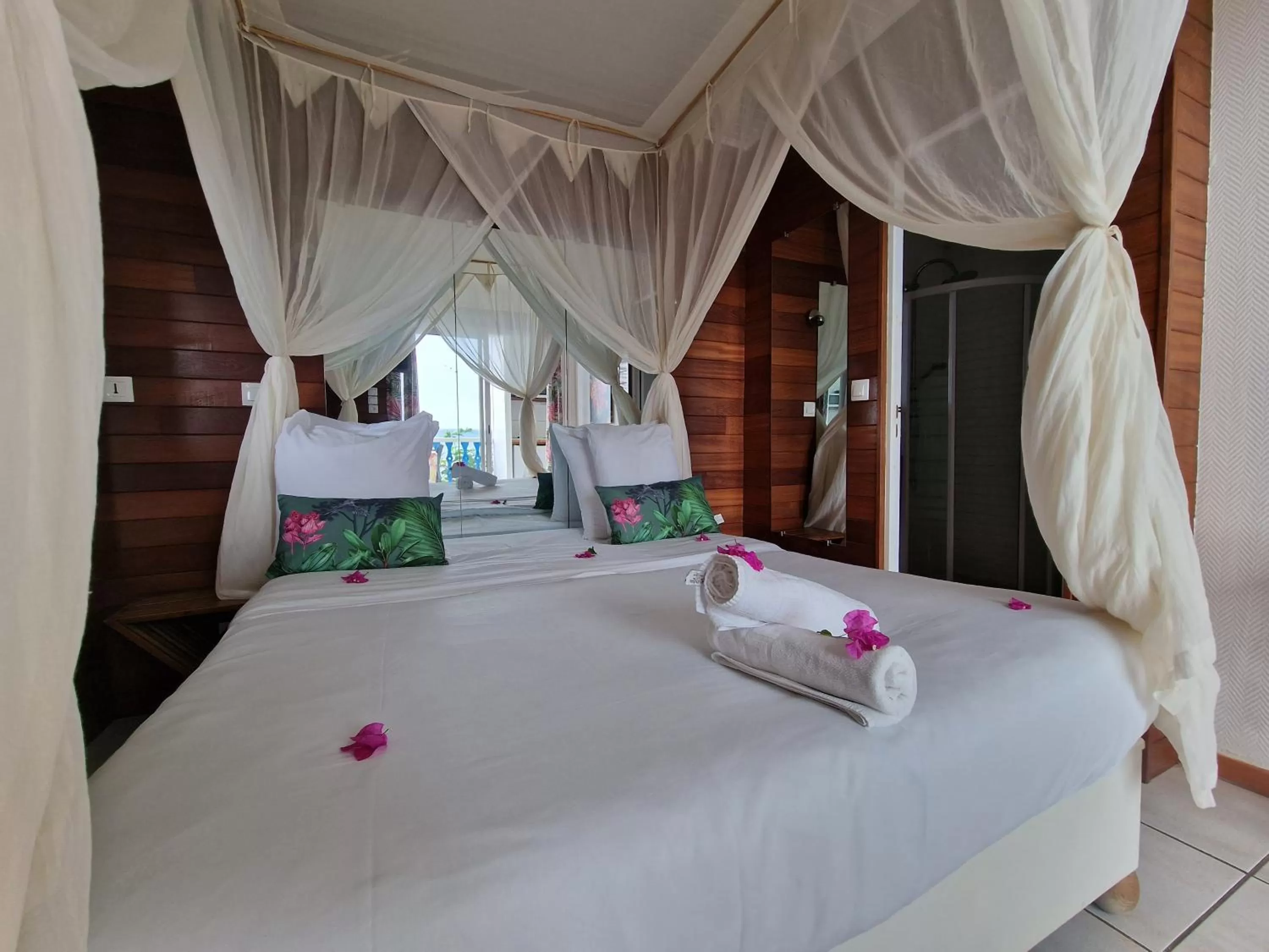 Bed in Hotel Le Manguier