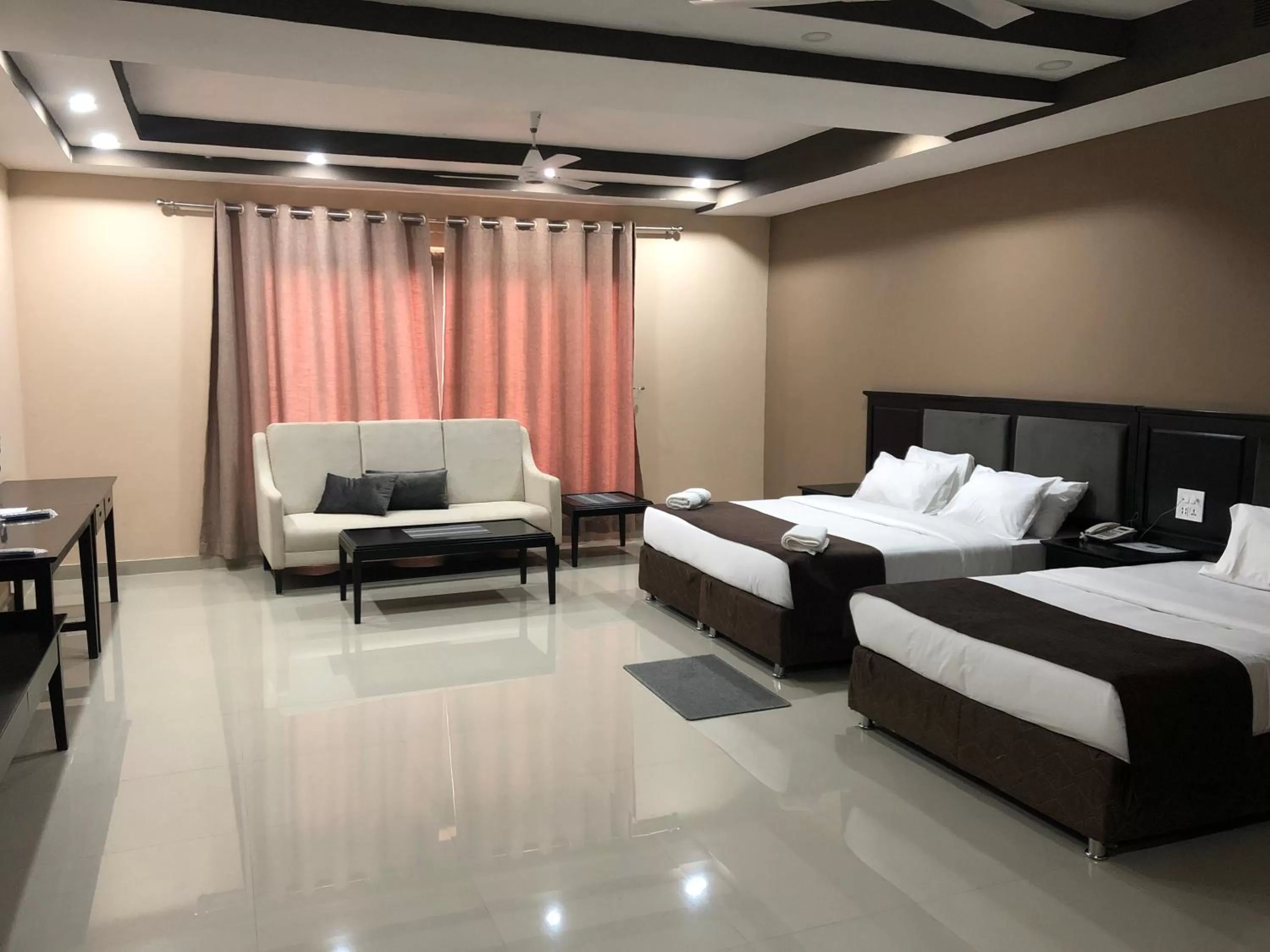 Deluxe Family Room in Palm Kalash Hotel