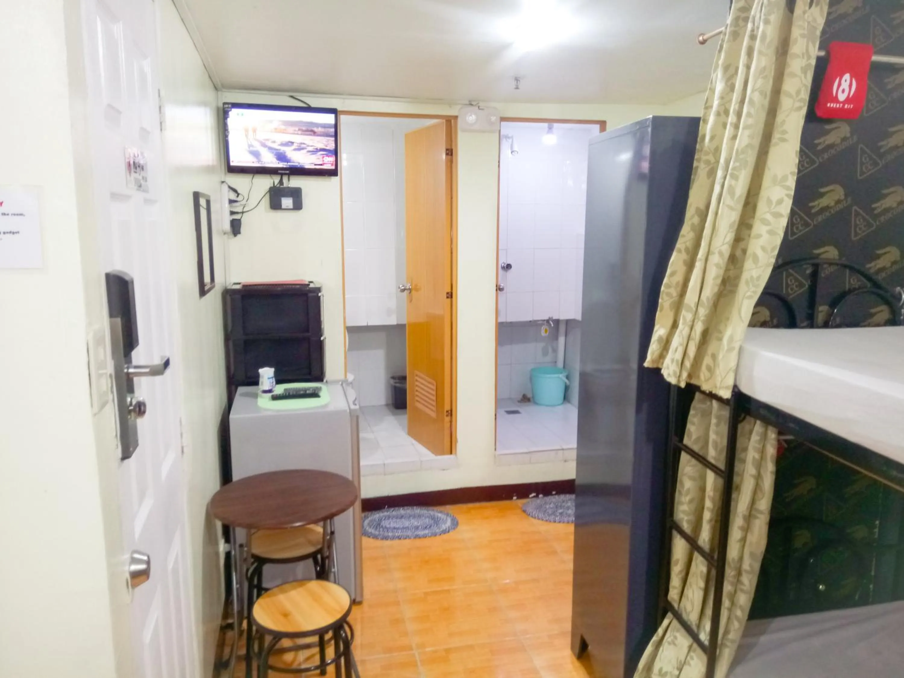 Communal lounge/ TV room in 8Hostel