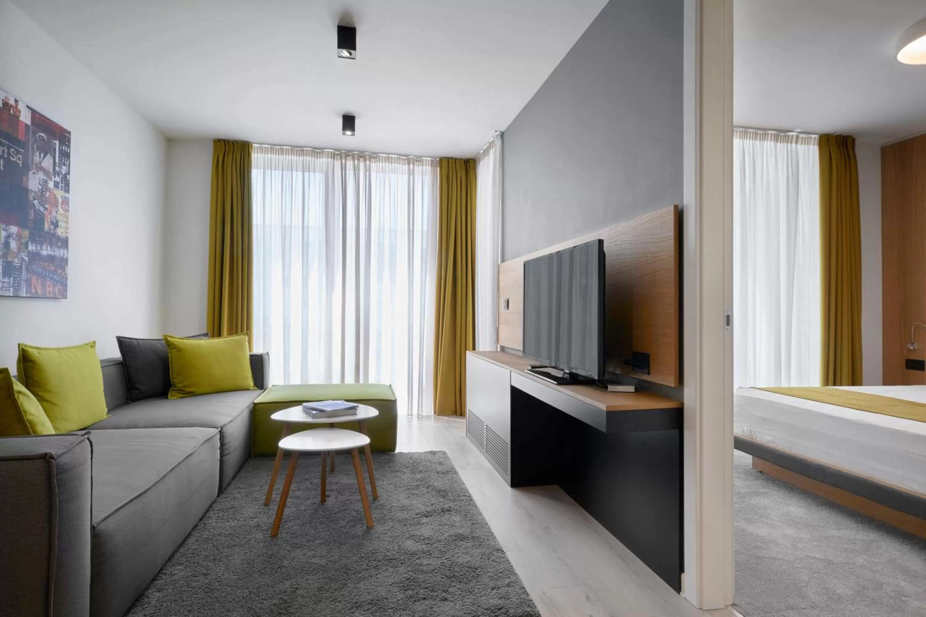 Communal lounge/ TV room, Bed in Adella Boutique Hotel - Free Secured Parking