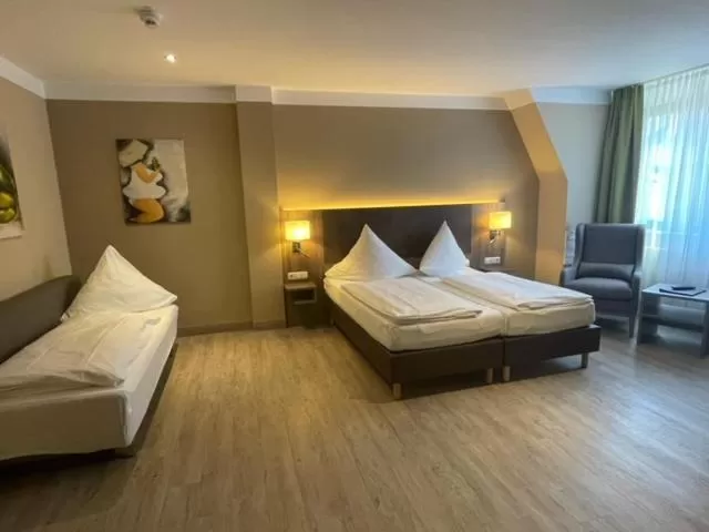 Double Room with Sofa Bed in Hotel Aulmann