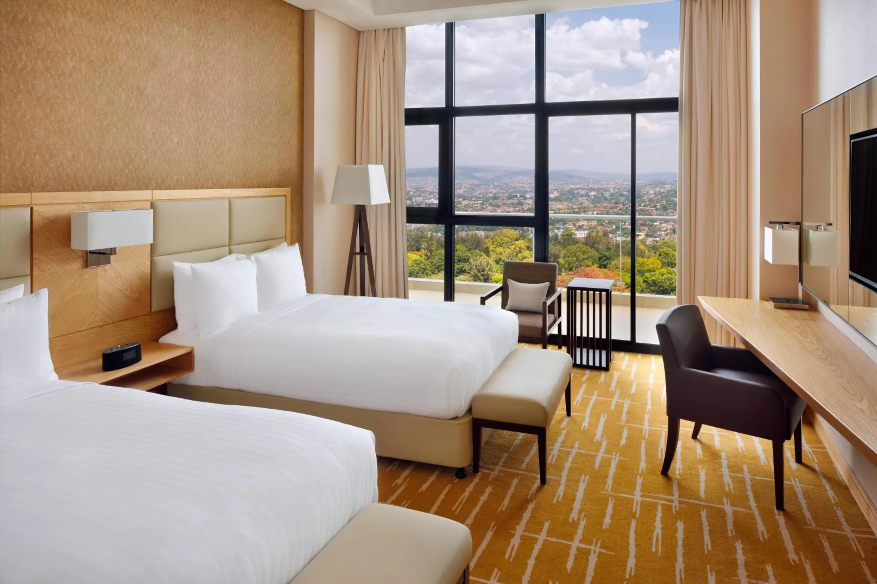 Photo of the whole room, Bed in Kigali Marriott Hotel