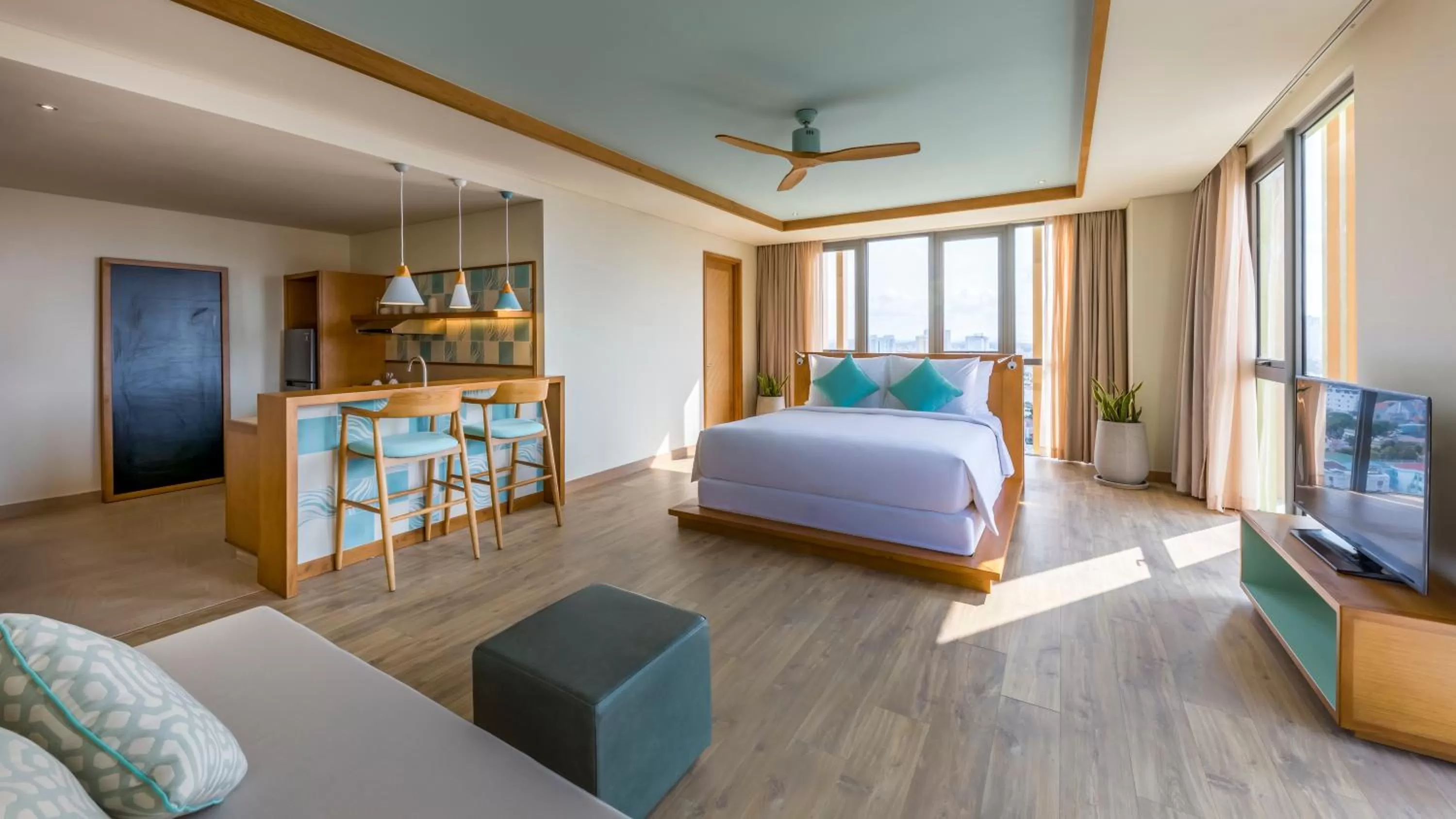 Living room, Bed in Fusion Suites Vung Tau