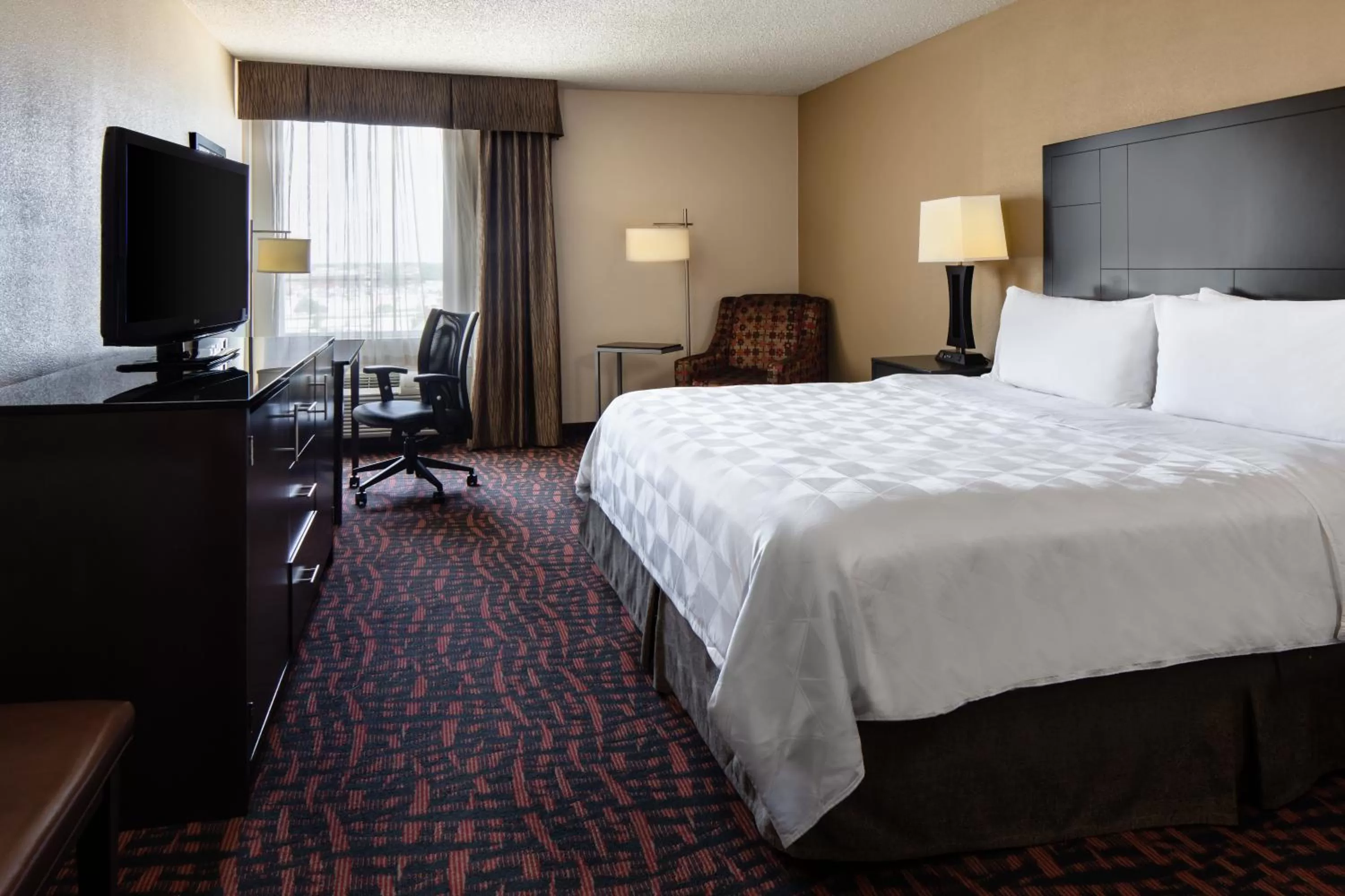 Photo of the whole room, Bed in Holiday Inn Wichita East I-35 by IHG
