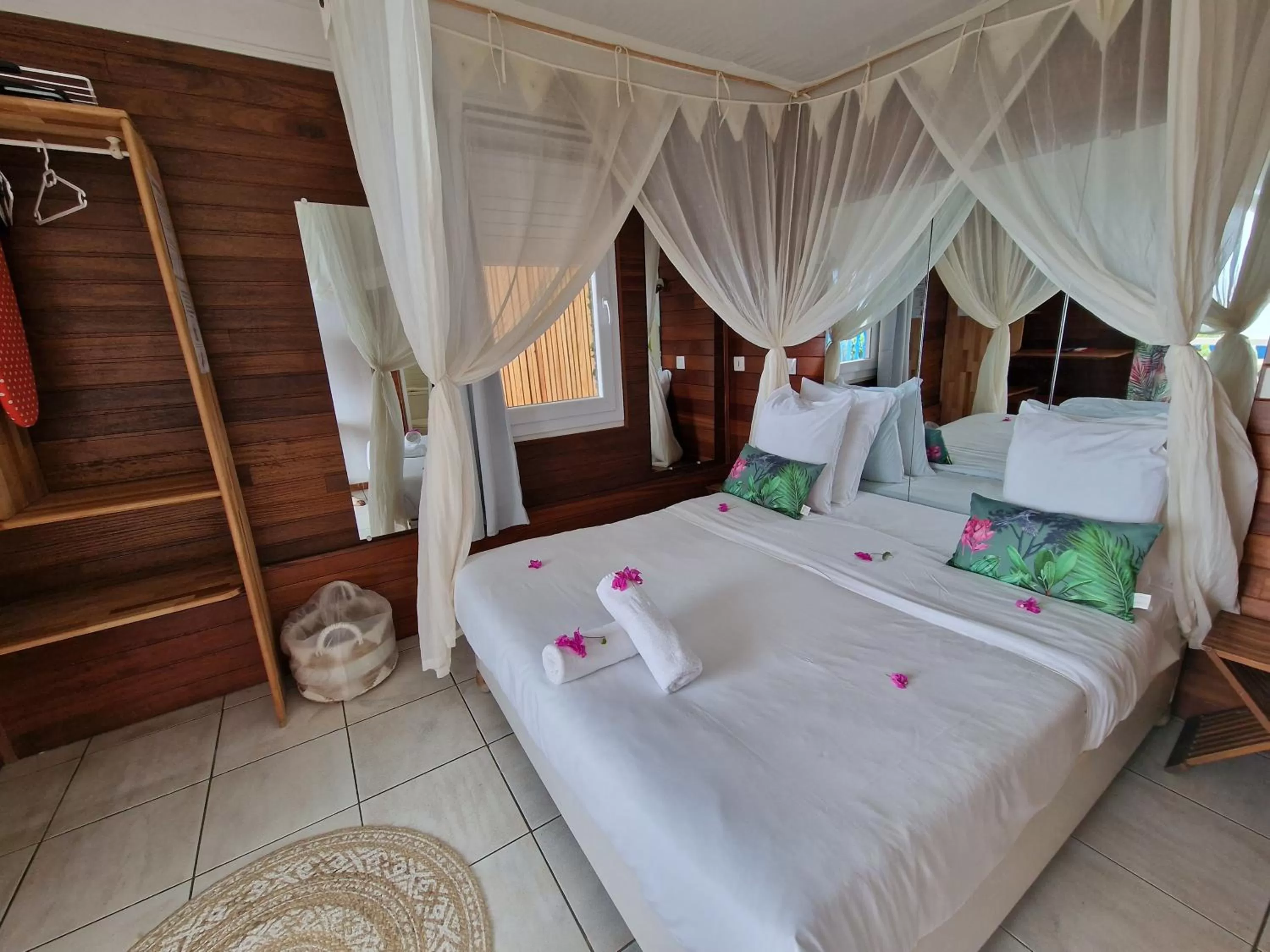 Bed in Hotel Le Manguier