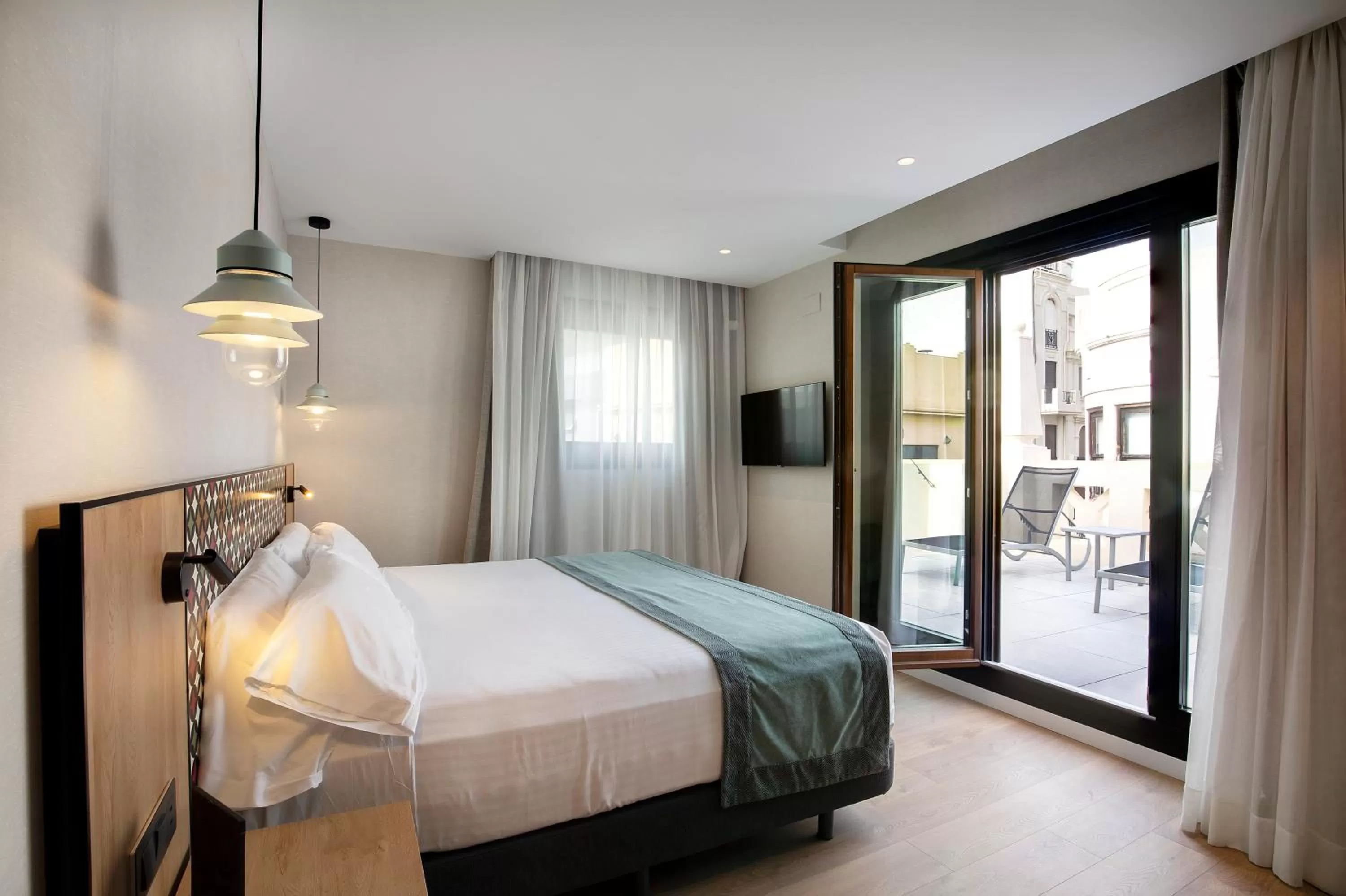 Junior Suite with Terrace in Catalonia Excelsior Hotel