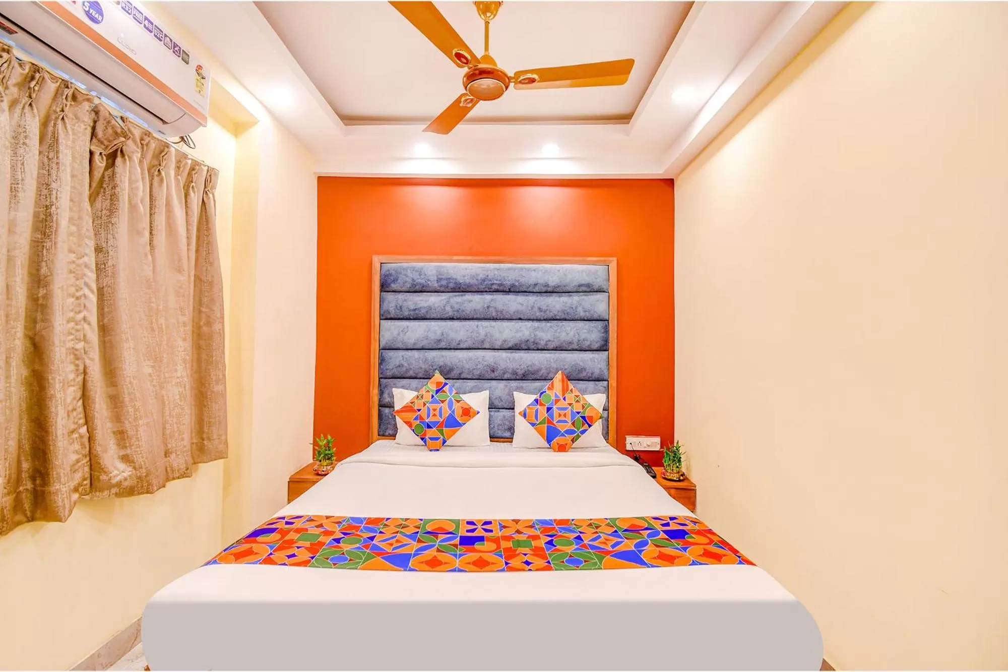 Bed in FabHotel Aqua Tulip - Nr Milan Mela