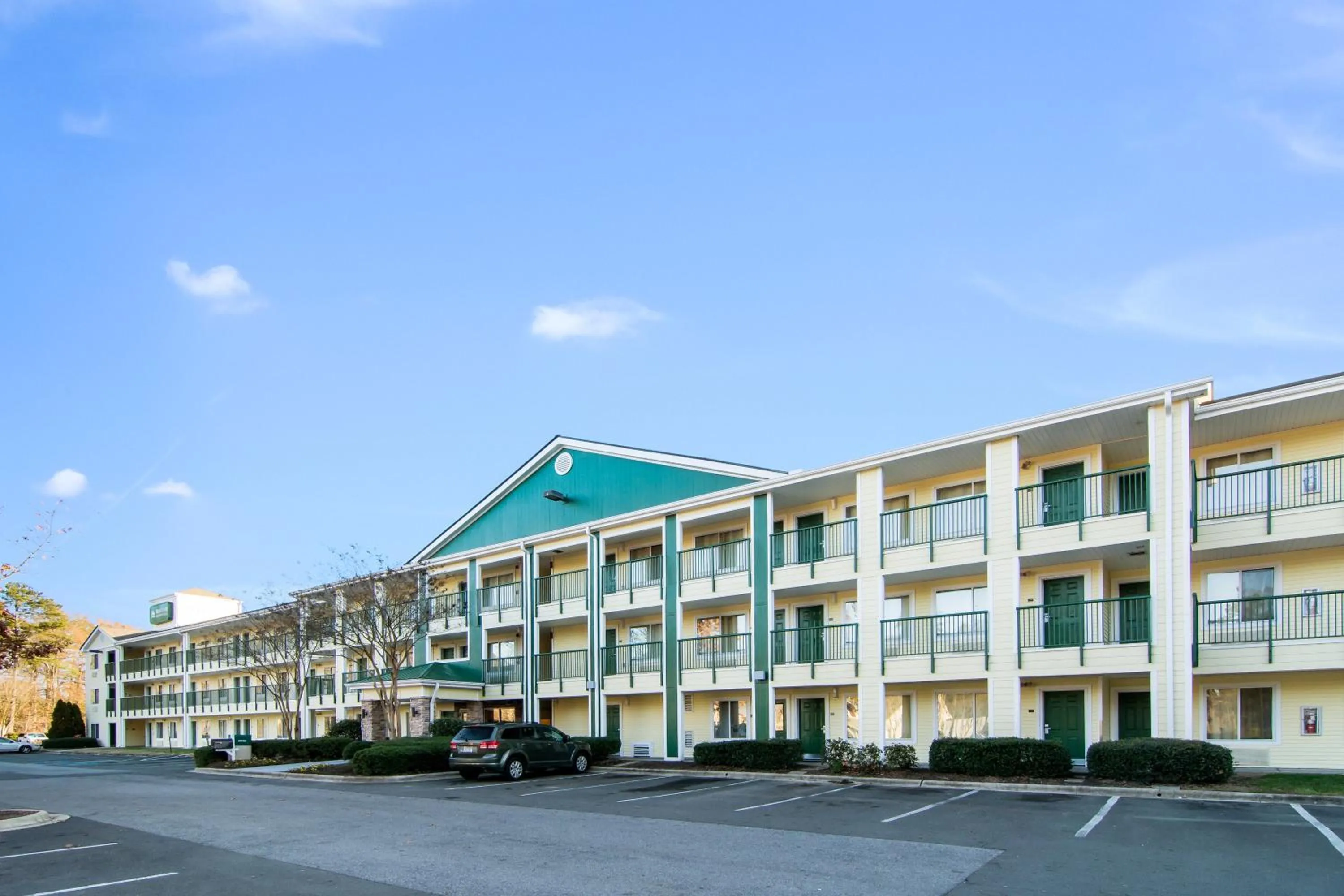 Property building in HomeTowne Studios by Red Roof Raleigh – Durham