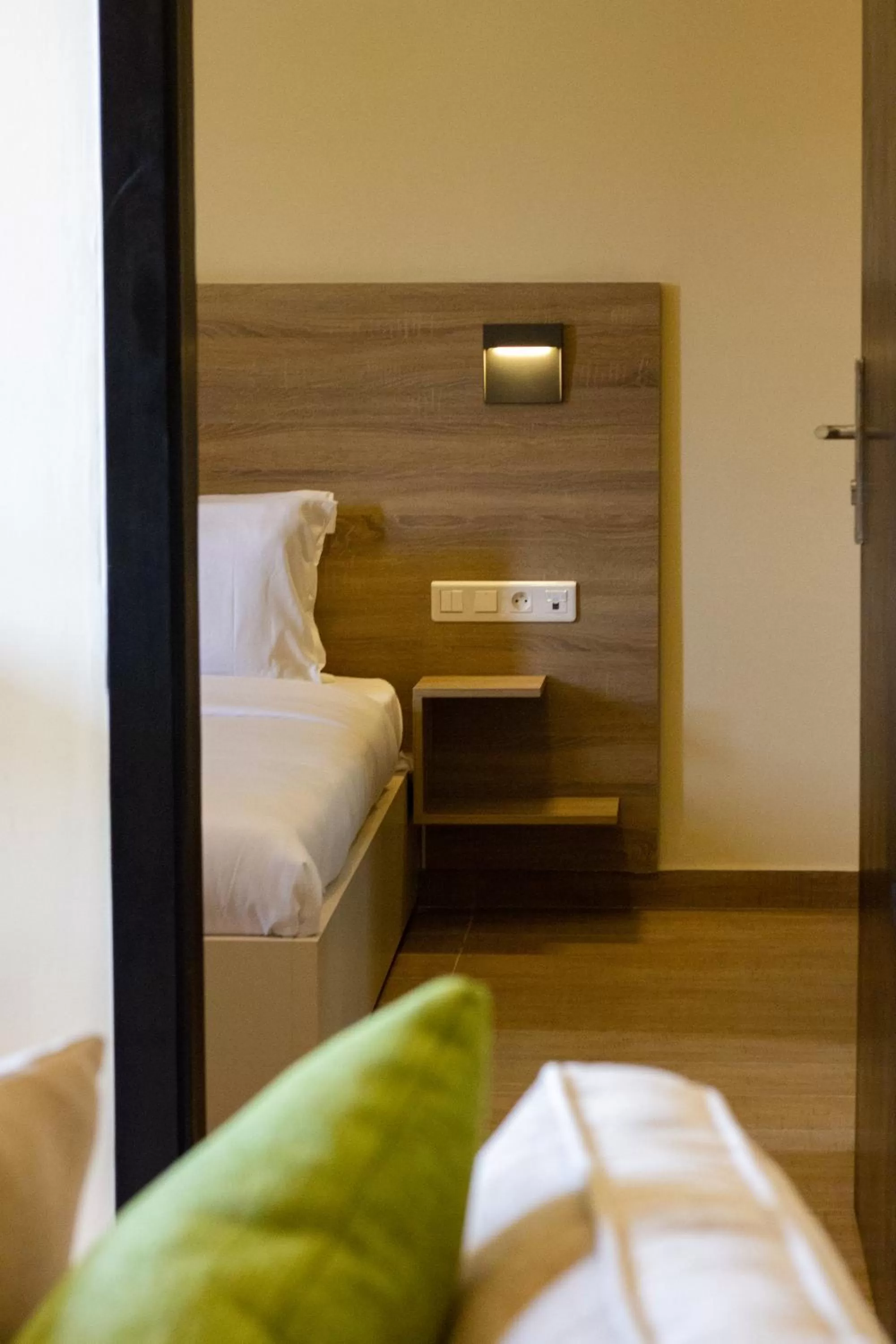 Living room, Bed in Silver Moon Hotel