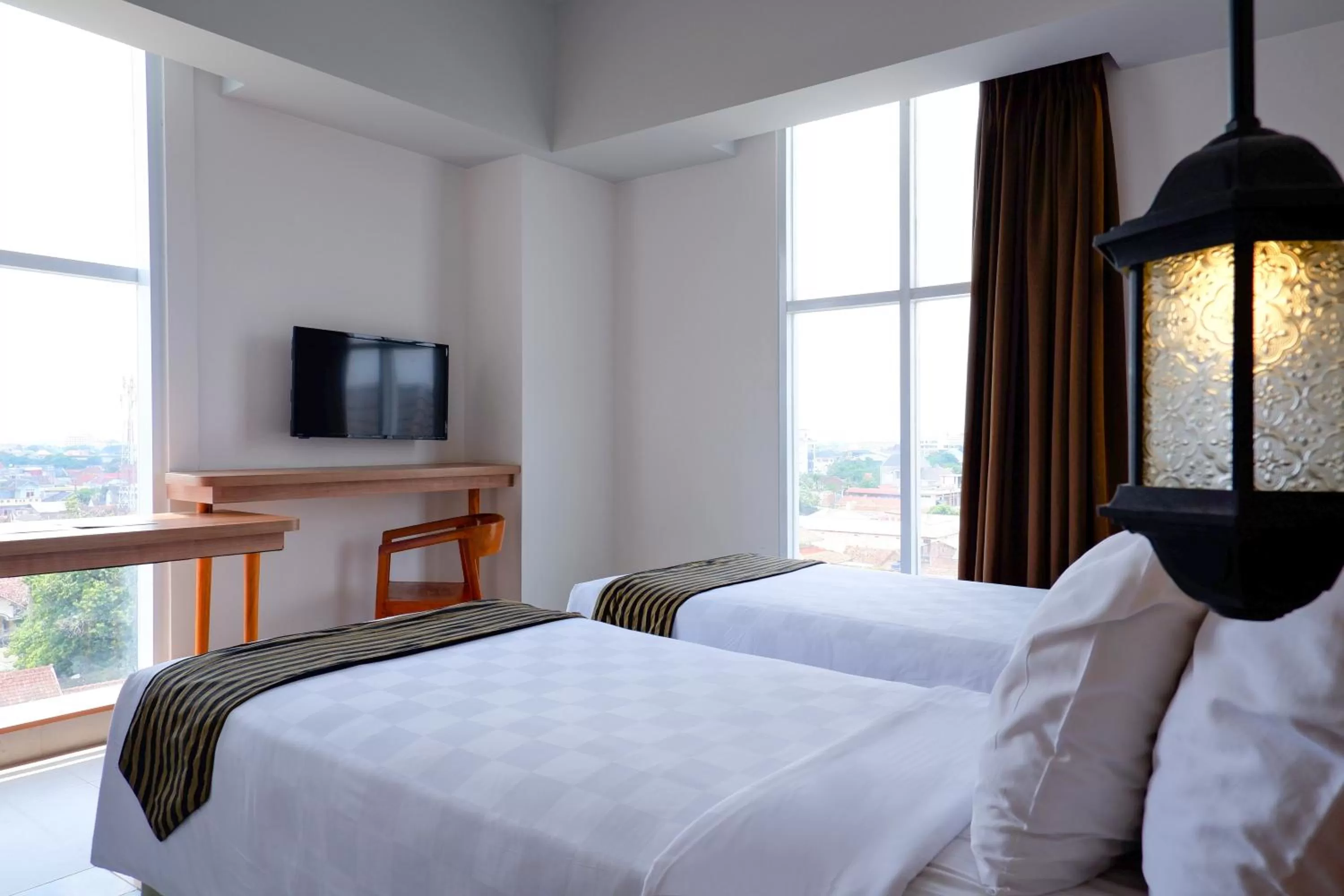 Bed in KHAS Tugu Hotel Yogyakarta