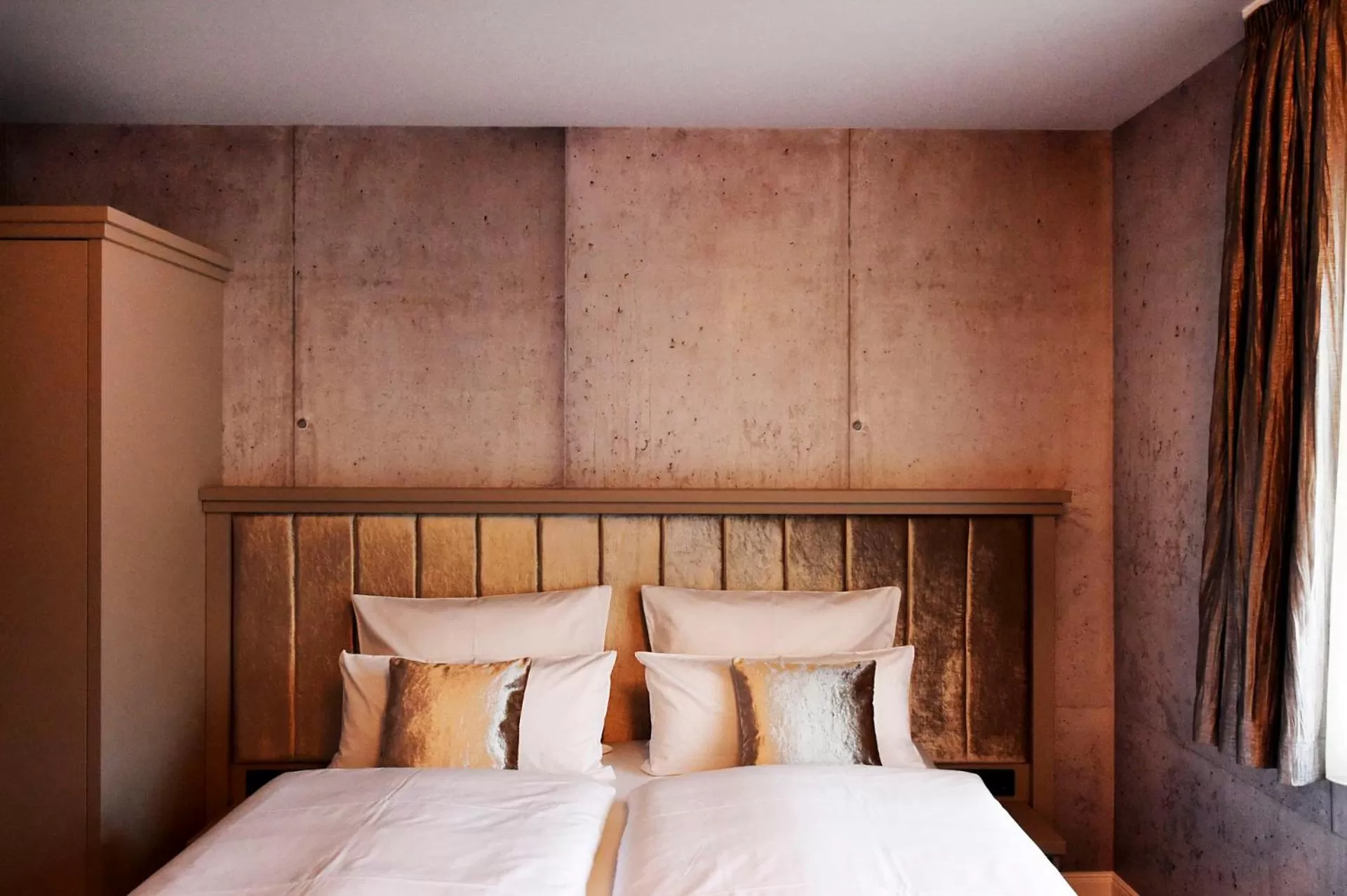 Decorative detail, Bed in MOMENTS Boutique Hotel