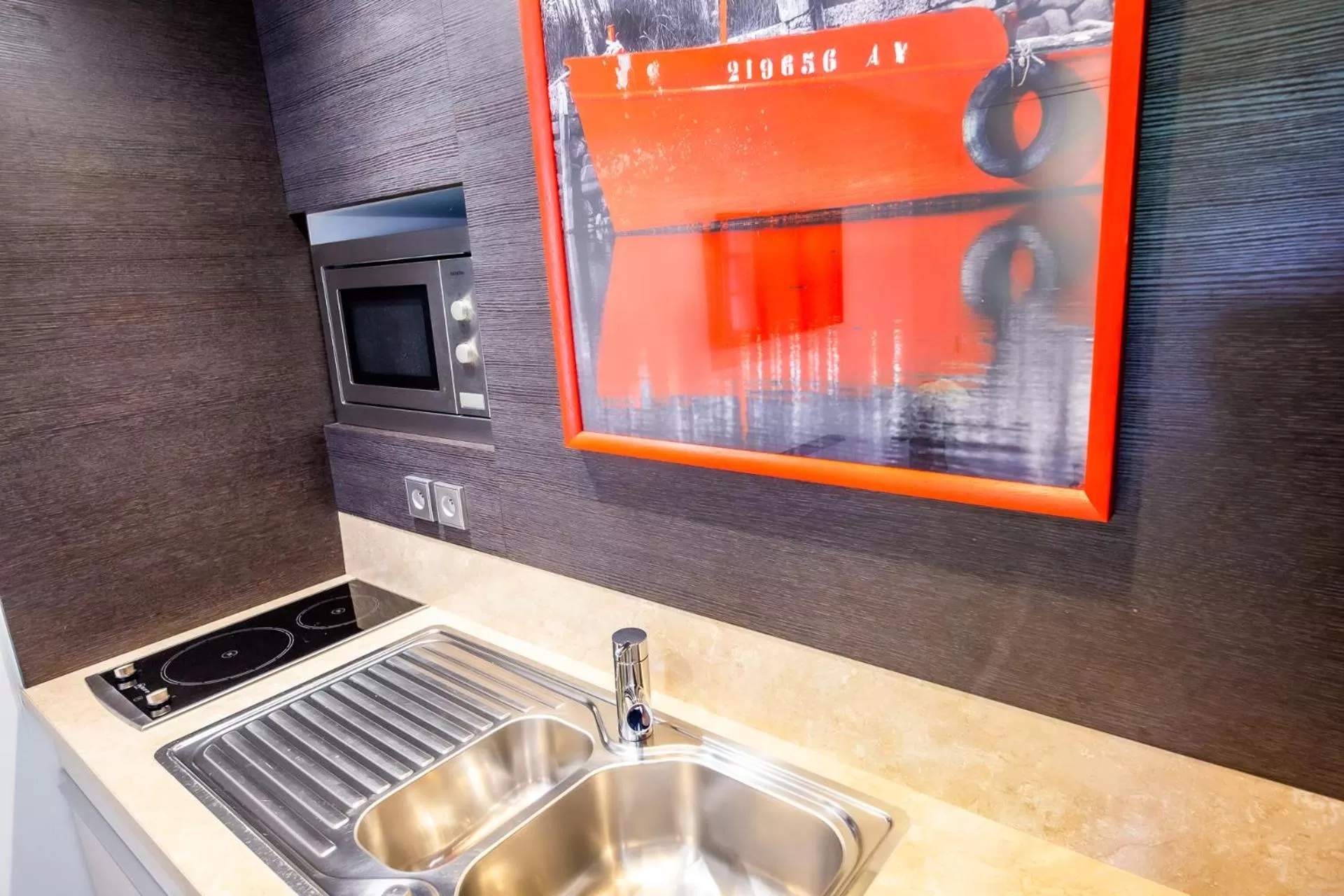 Kitchen or kitchenette in La Ferme de l'Oudon & SPA