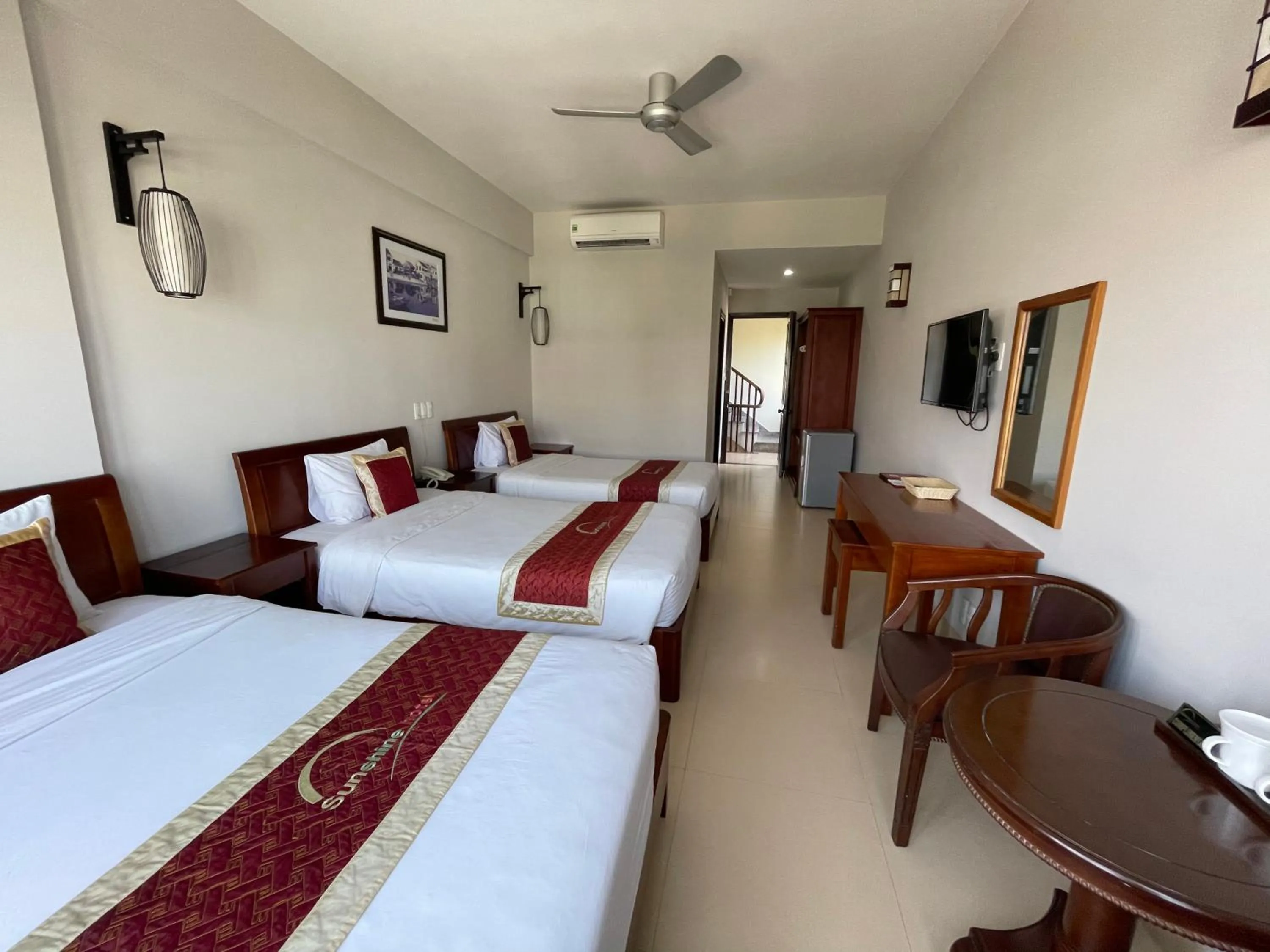 Bed in Sunshine Hoian Hotel