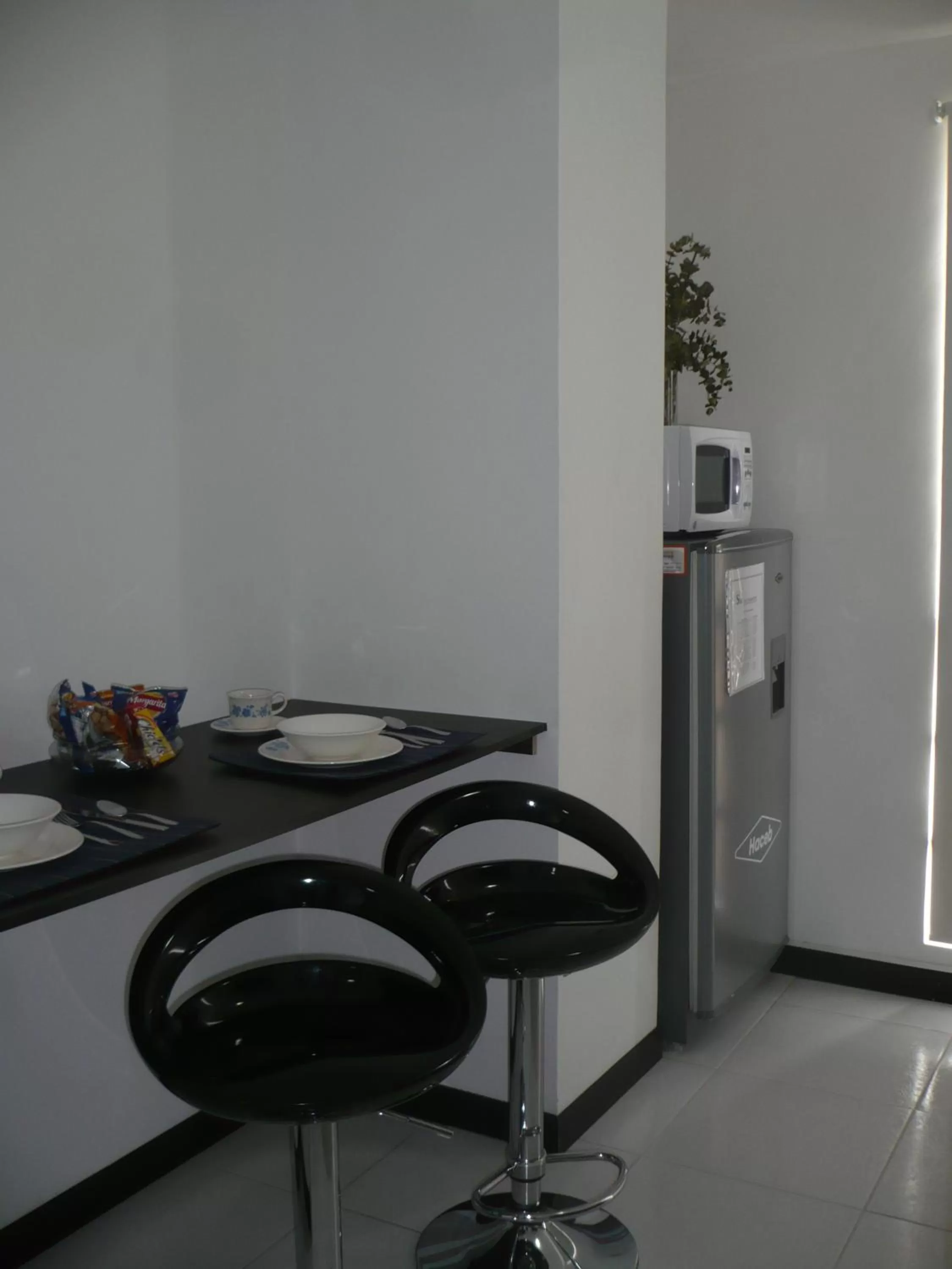 Dining area in Apartasuites San Marcos