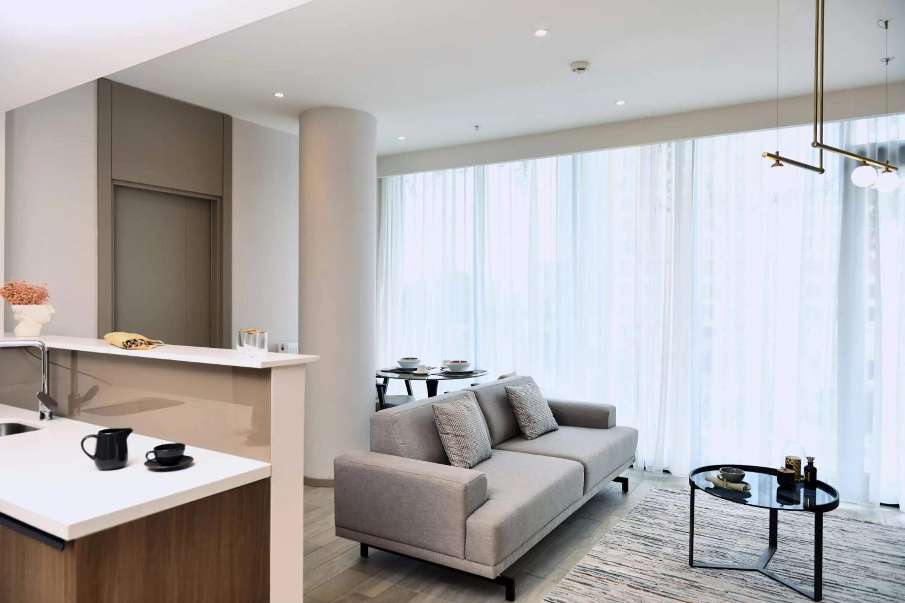 Living room in WestSide Residences by Rotana