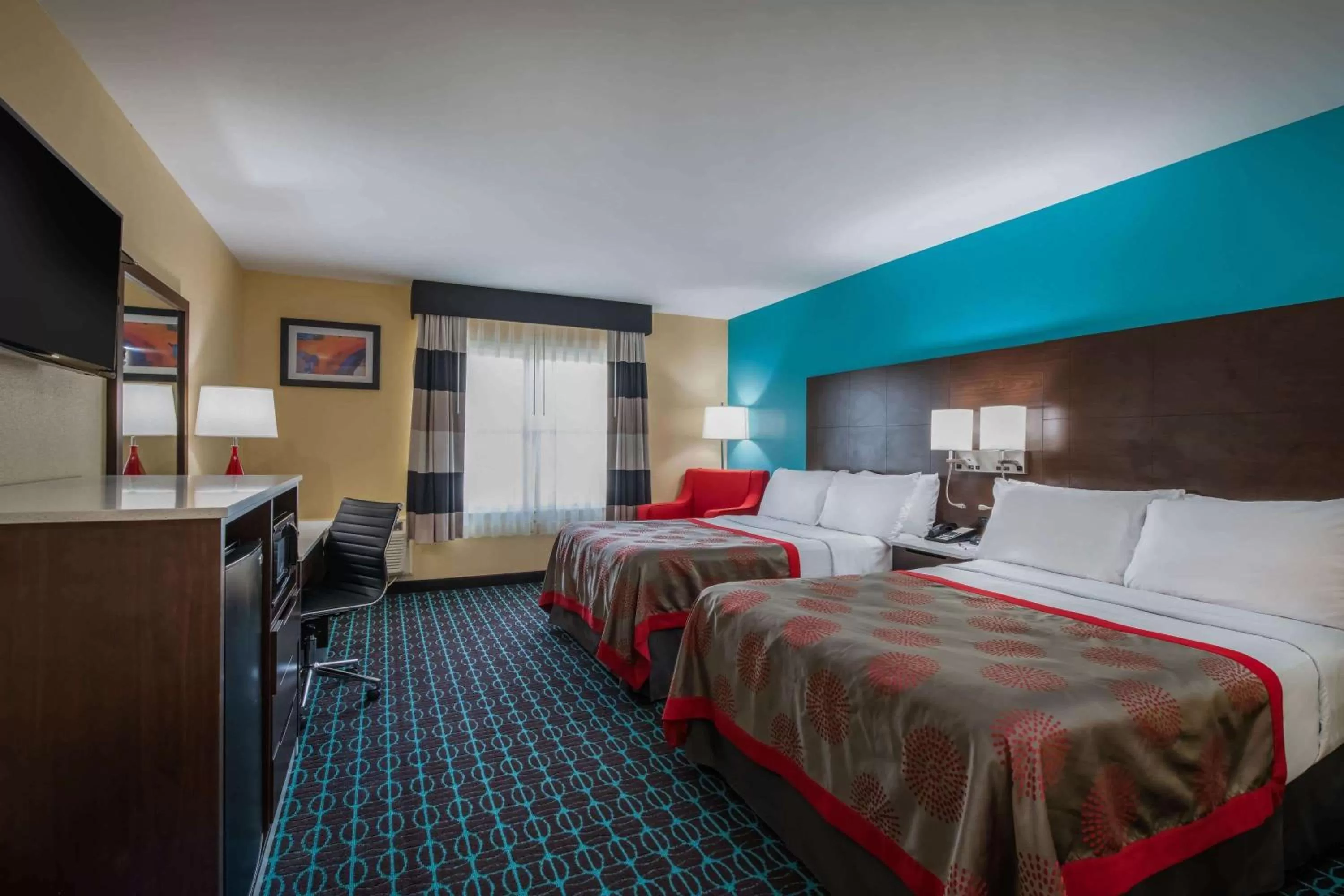 Photo of the whole room, Bed in Ramada by Wyndham Groton Mystic
