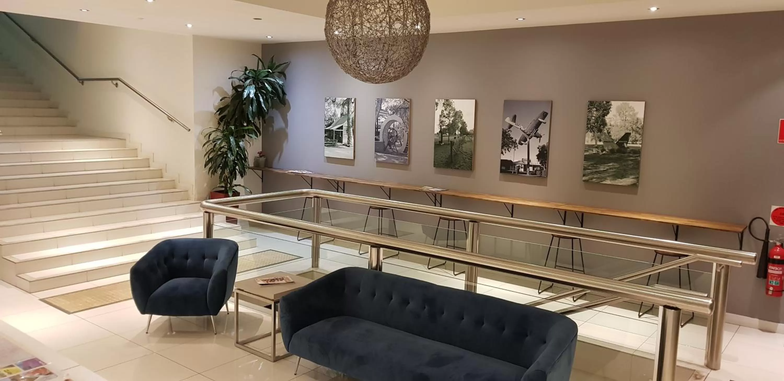 Lobby or reception in The Grand Motel