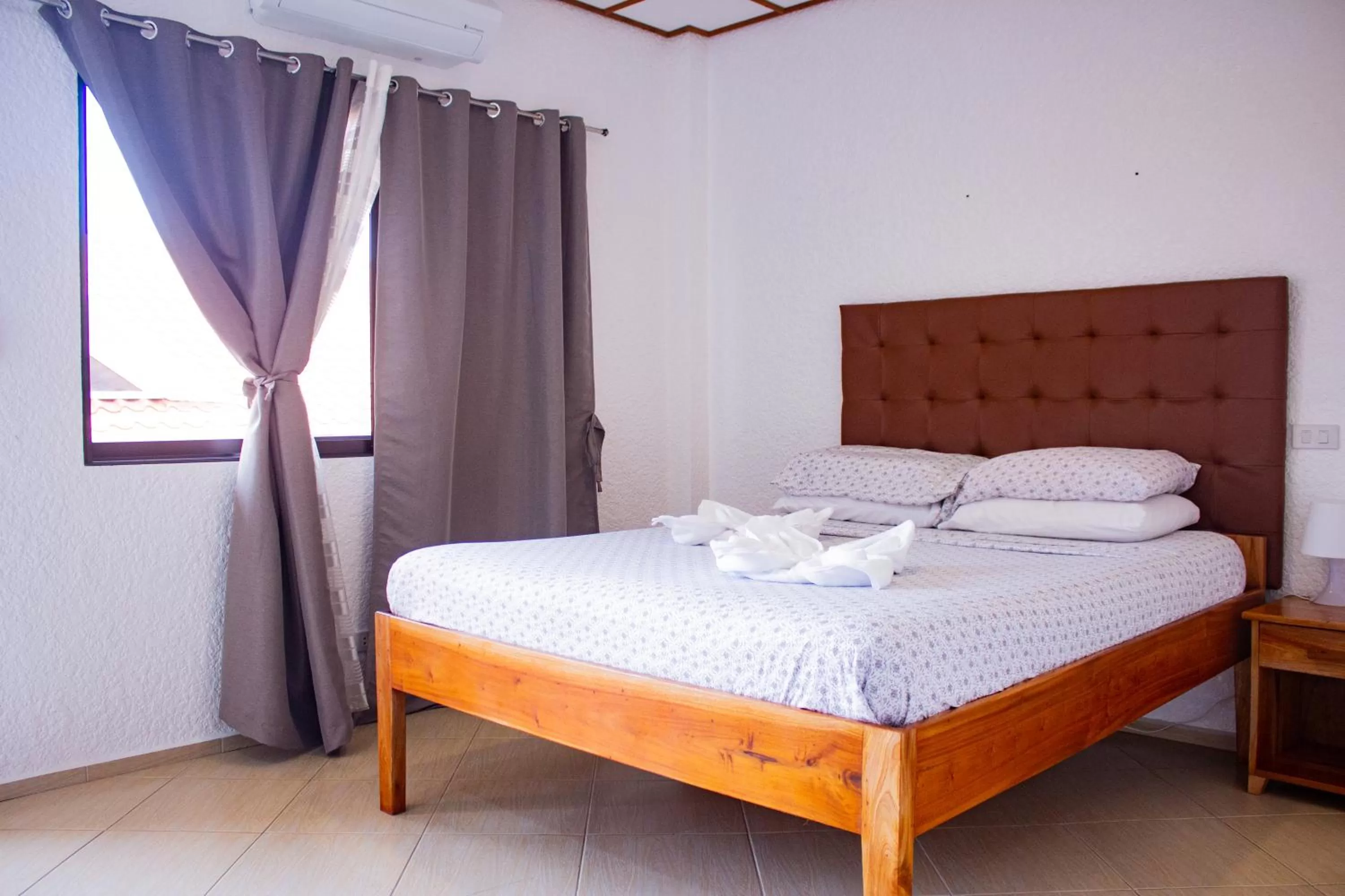 Bed in Jugalis Hotel and Restaurant