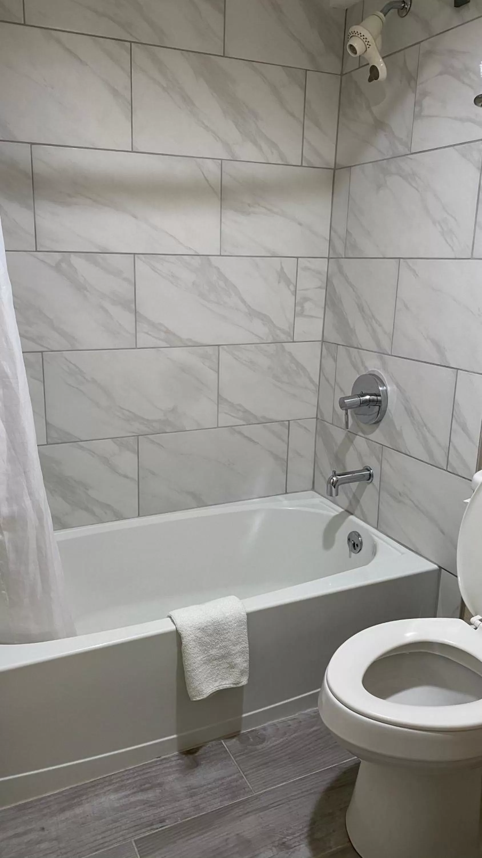 Toilet in Ramada by Wyndham Harrisonburg