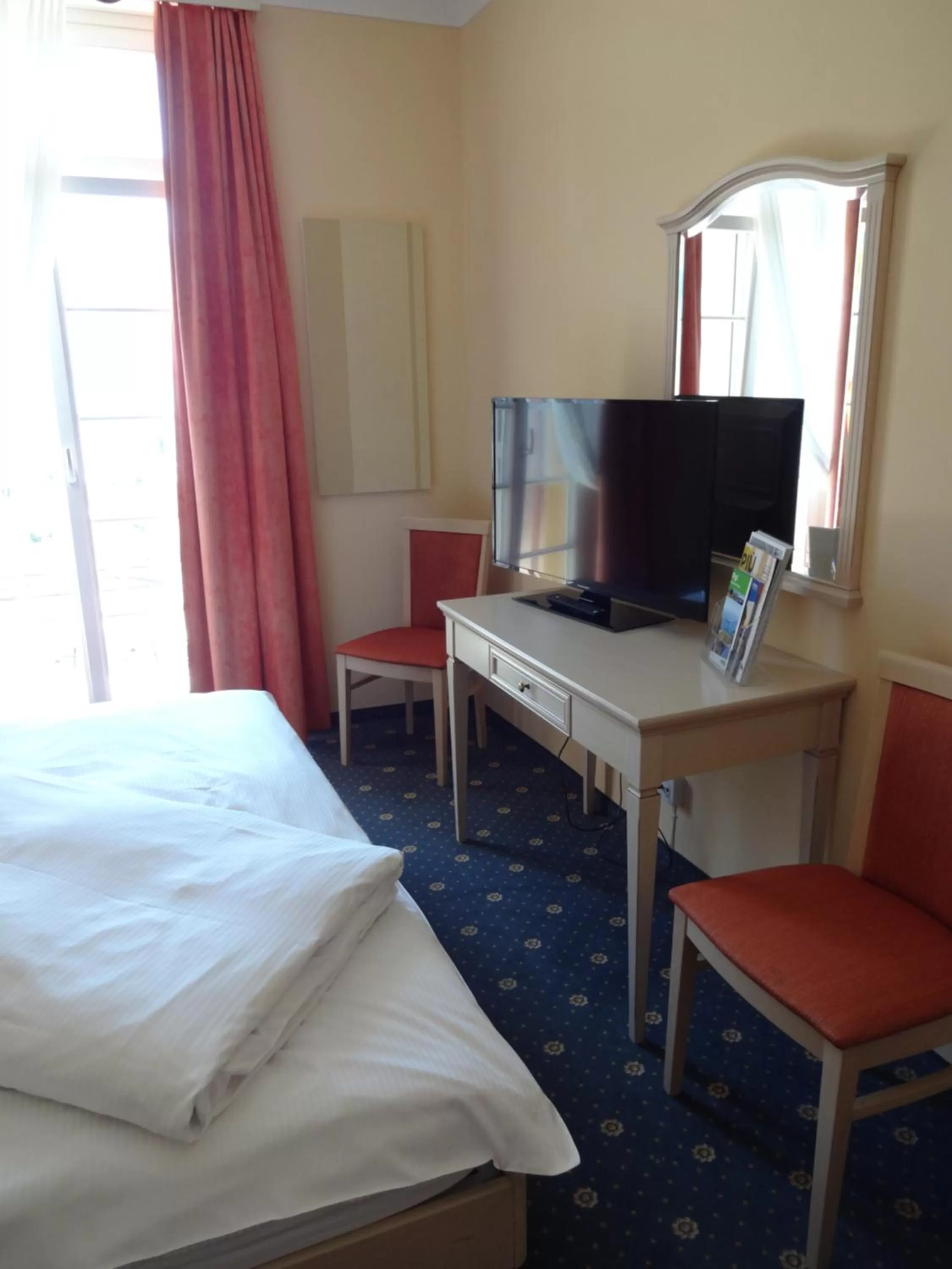 Bedroom in Hotel Schweizerhof