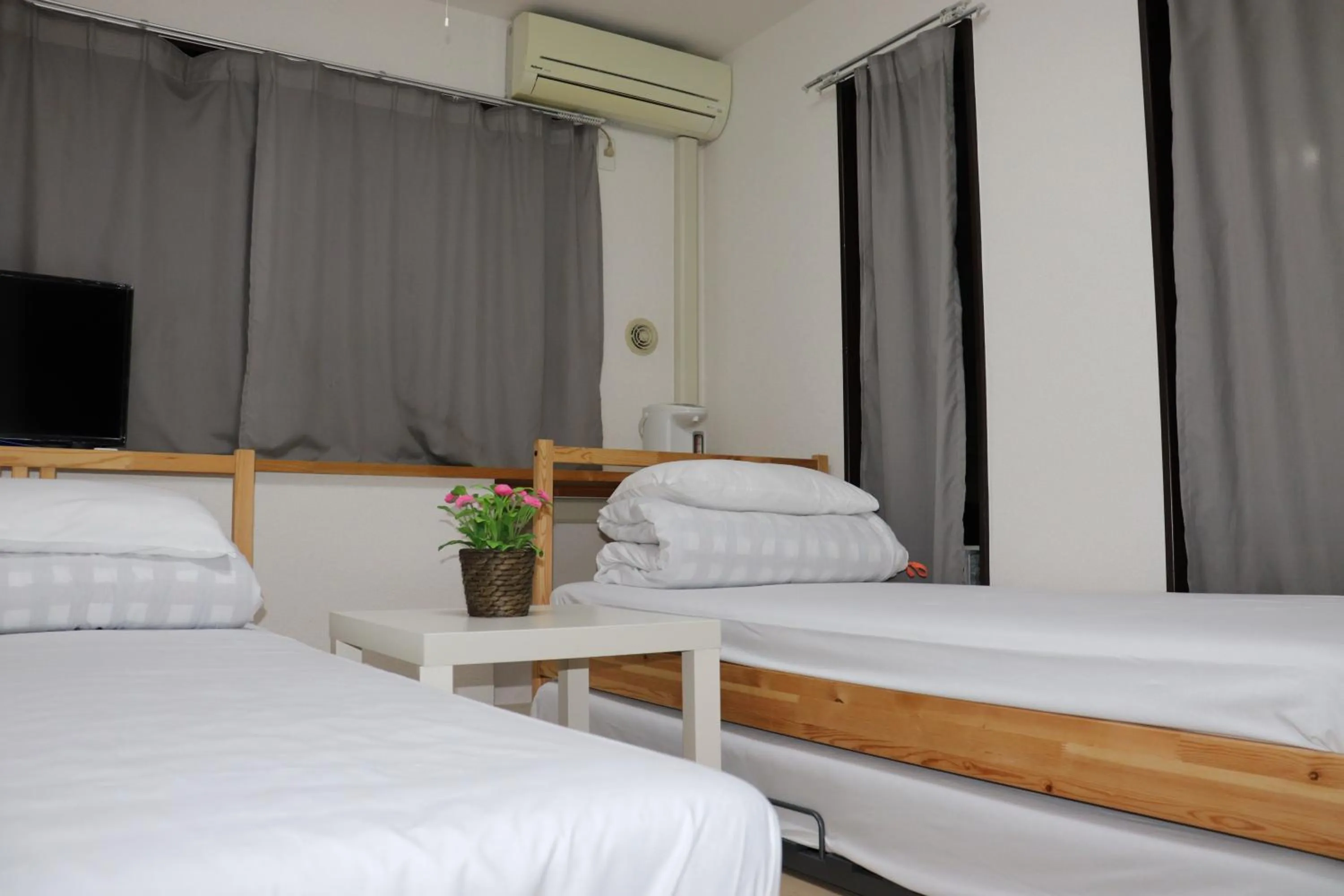 Bed in Sophiearth Apartment