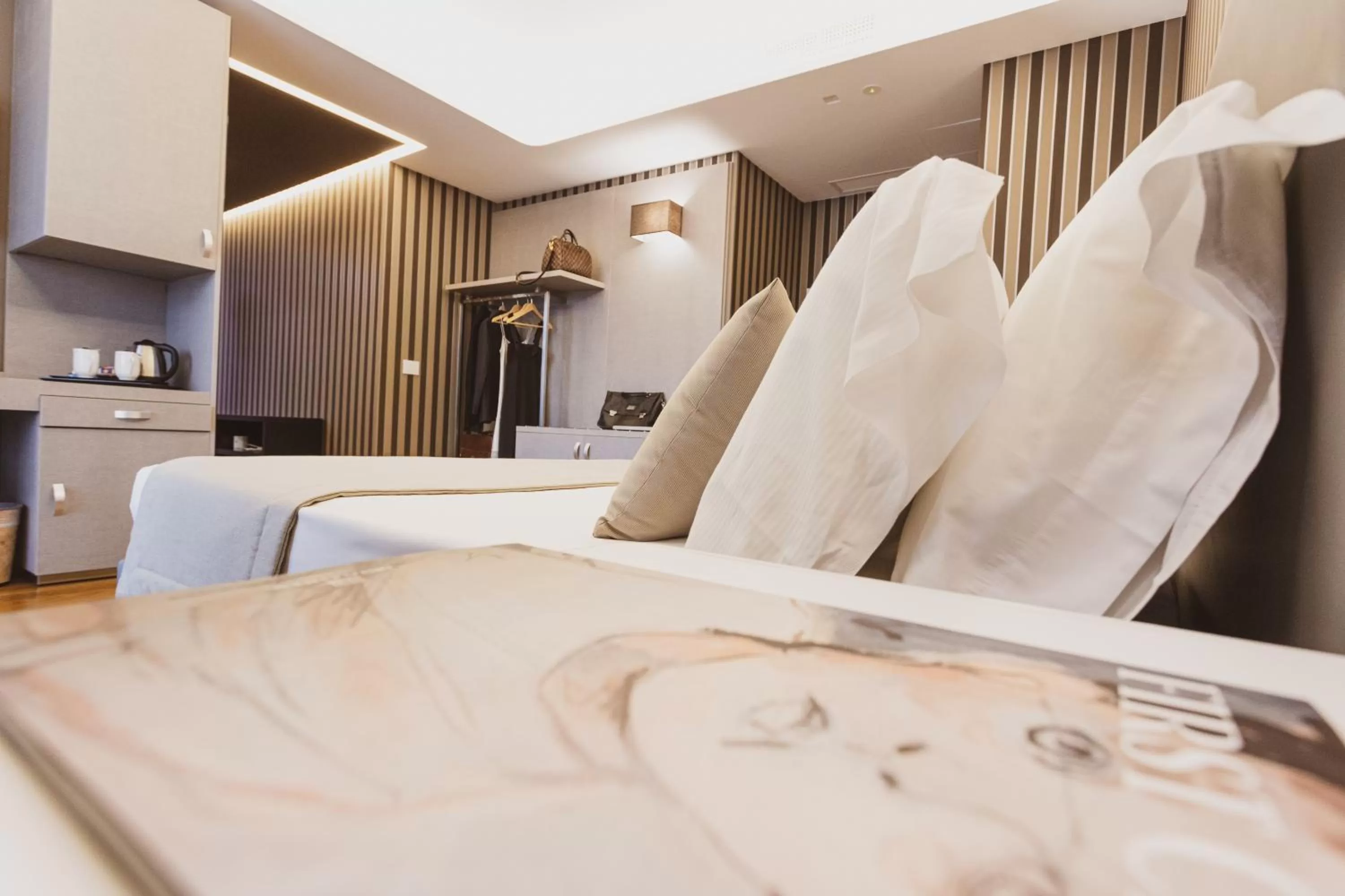 Bed in Callistos Hotel & Spa