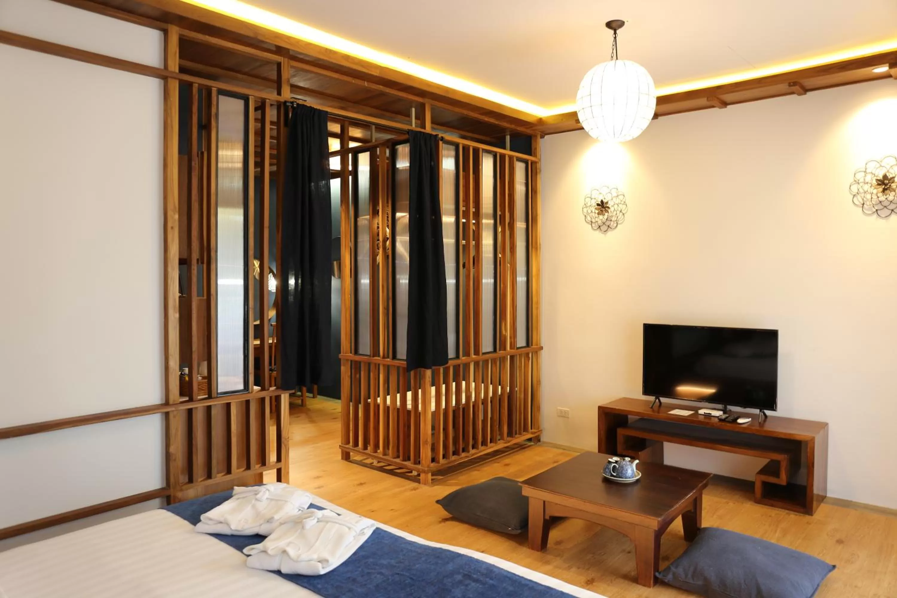 Living room, Bed in Tharaburi Resort
