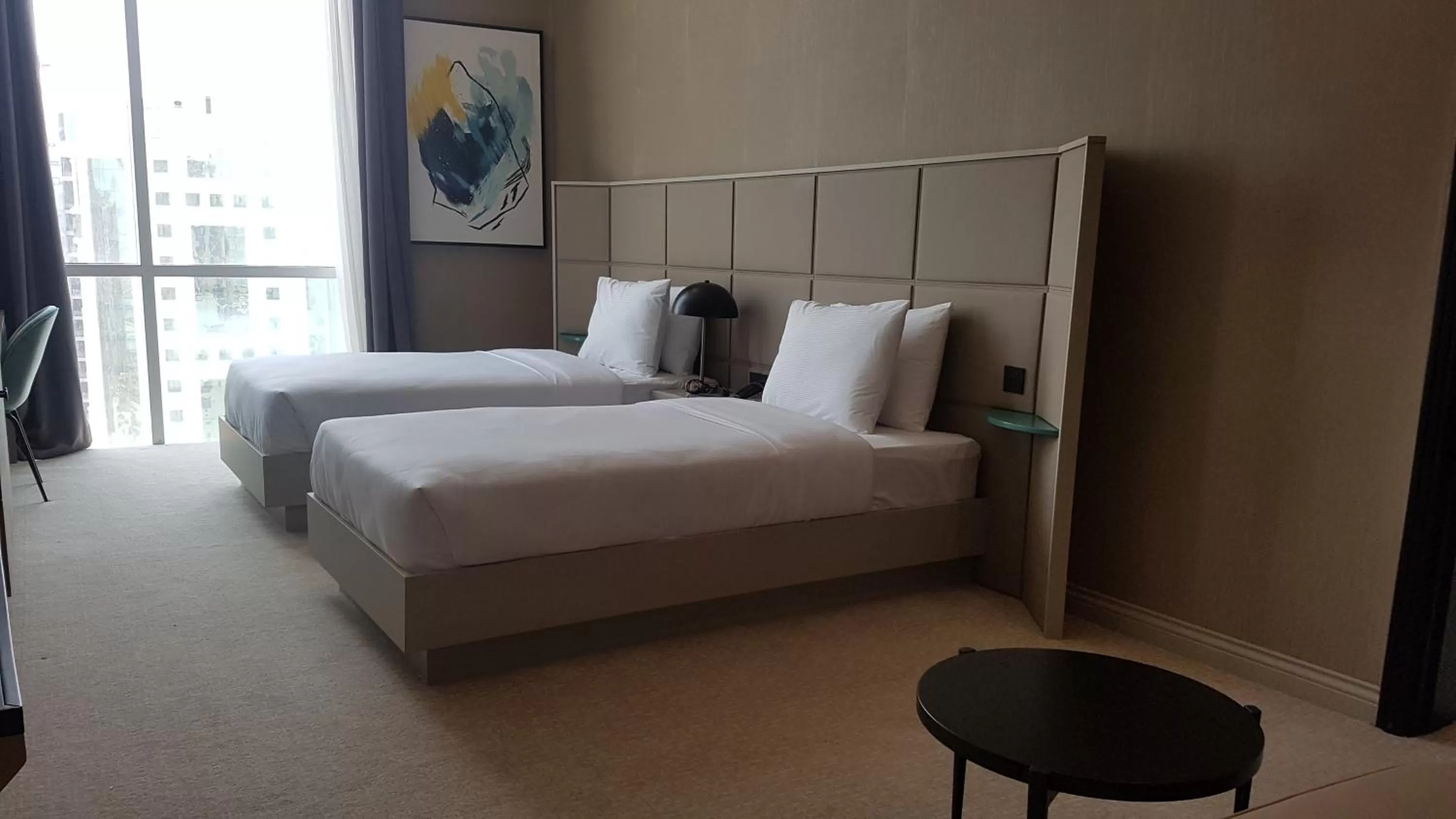 Bed in Horizon Manor Hotel