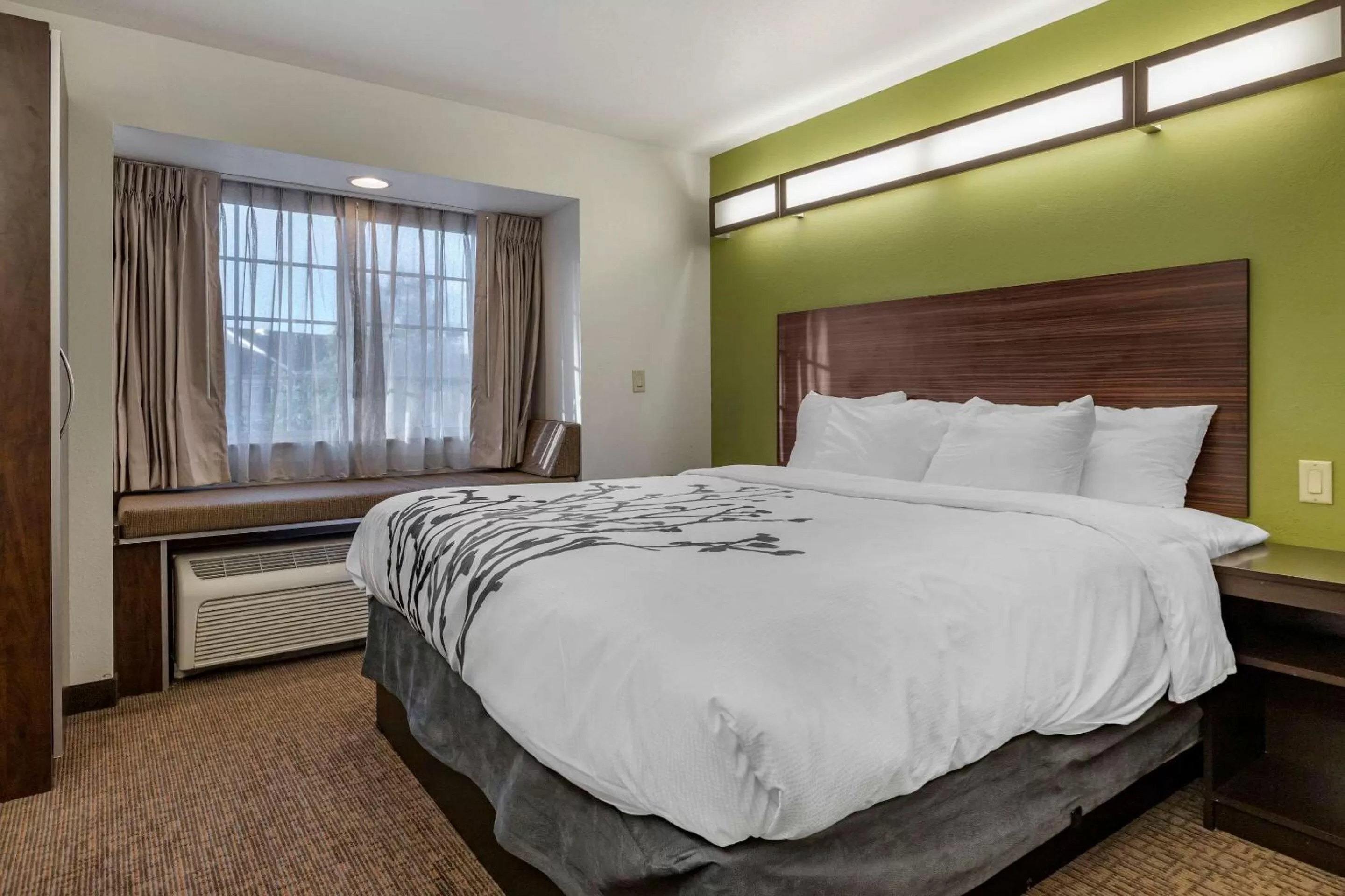 Photo of the whole room, Bed in Sleep Inn & Suites