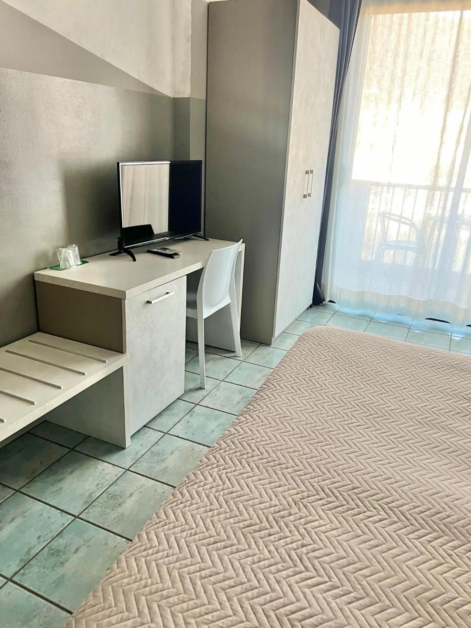 Bed in Hotel Stazione sul lago di Iseo