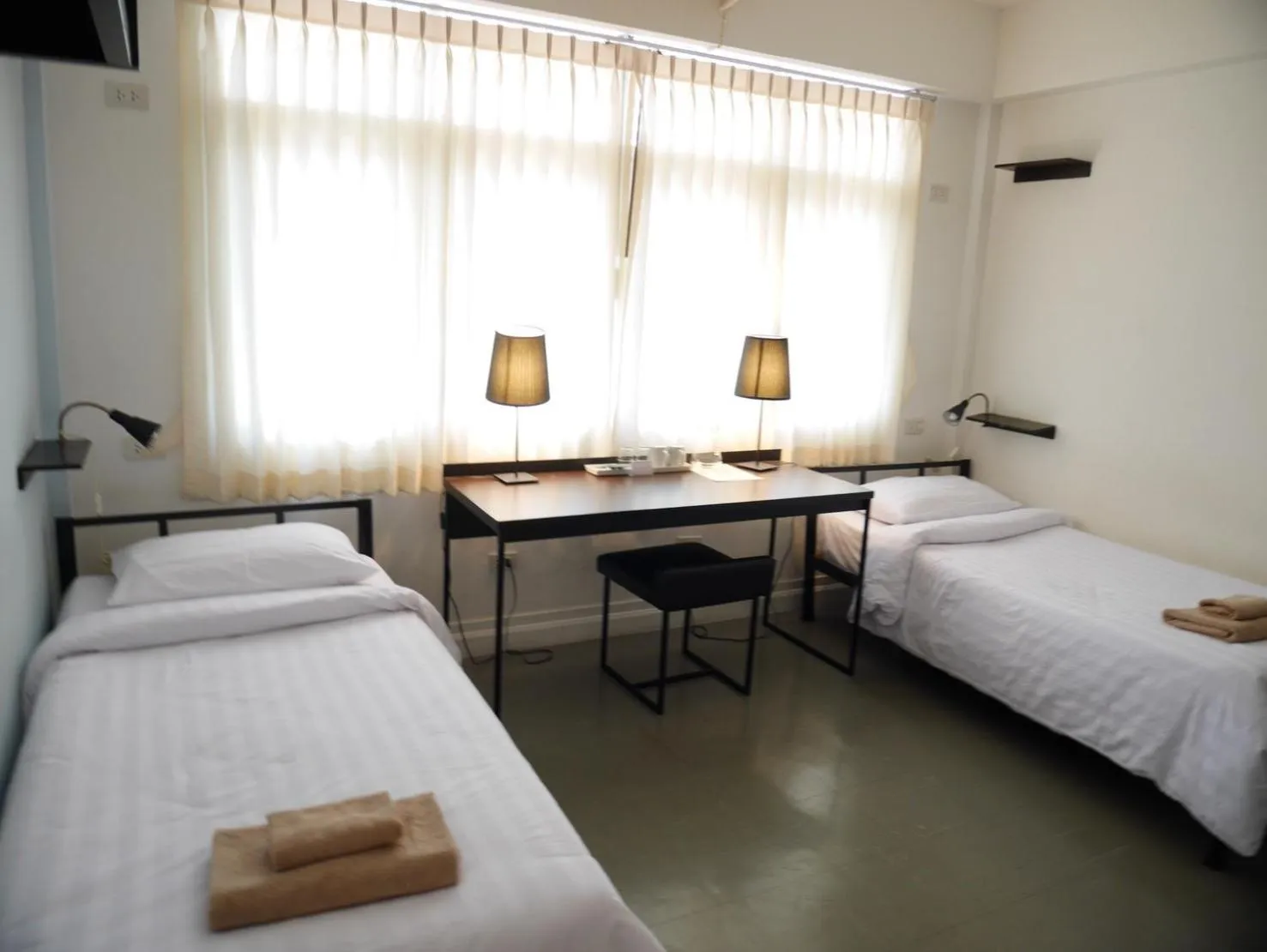 Bed in G9 Bangkok Hotel