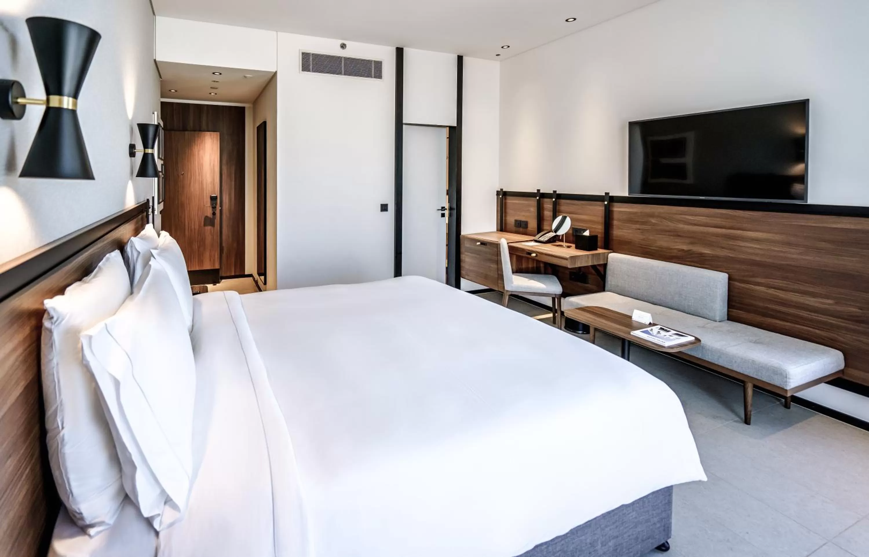 Bed in FORM Hotel Al Jaddaf, Dubai, a Member of Design Hotels