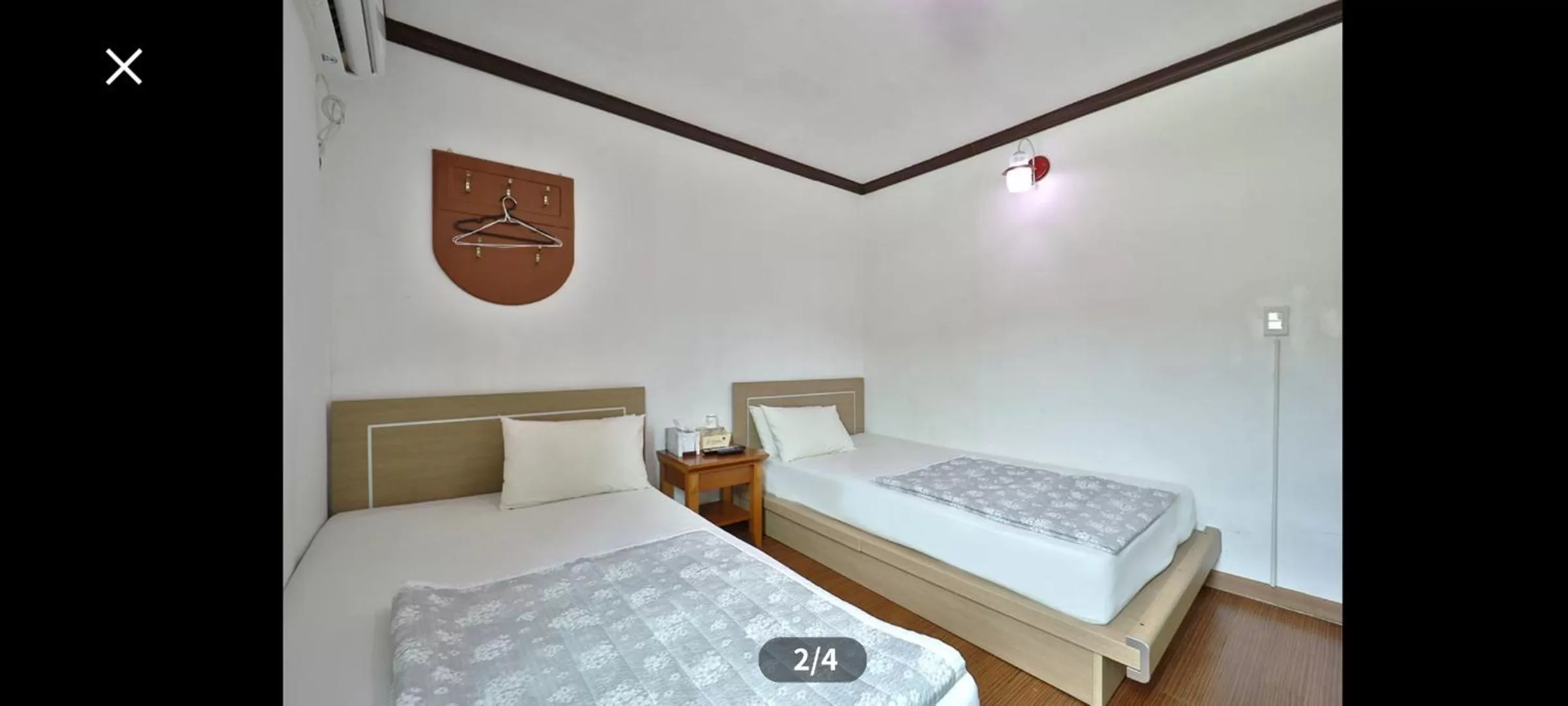 Bed in Saipan Motel with Sea View