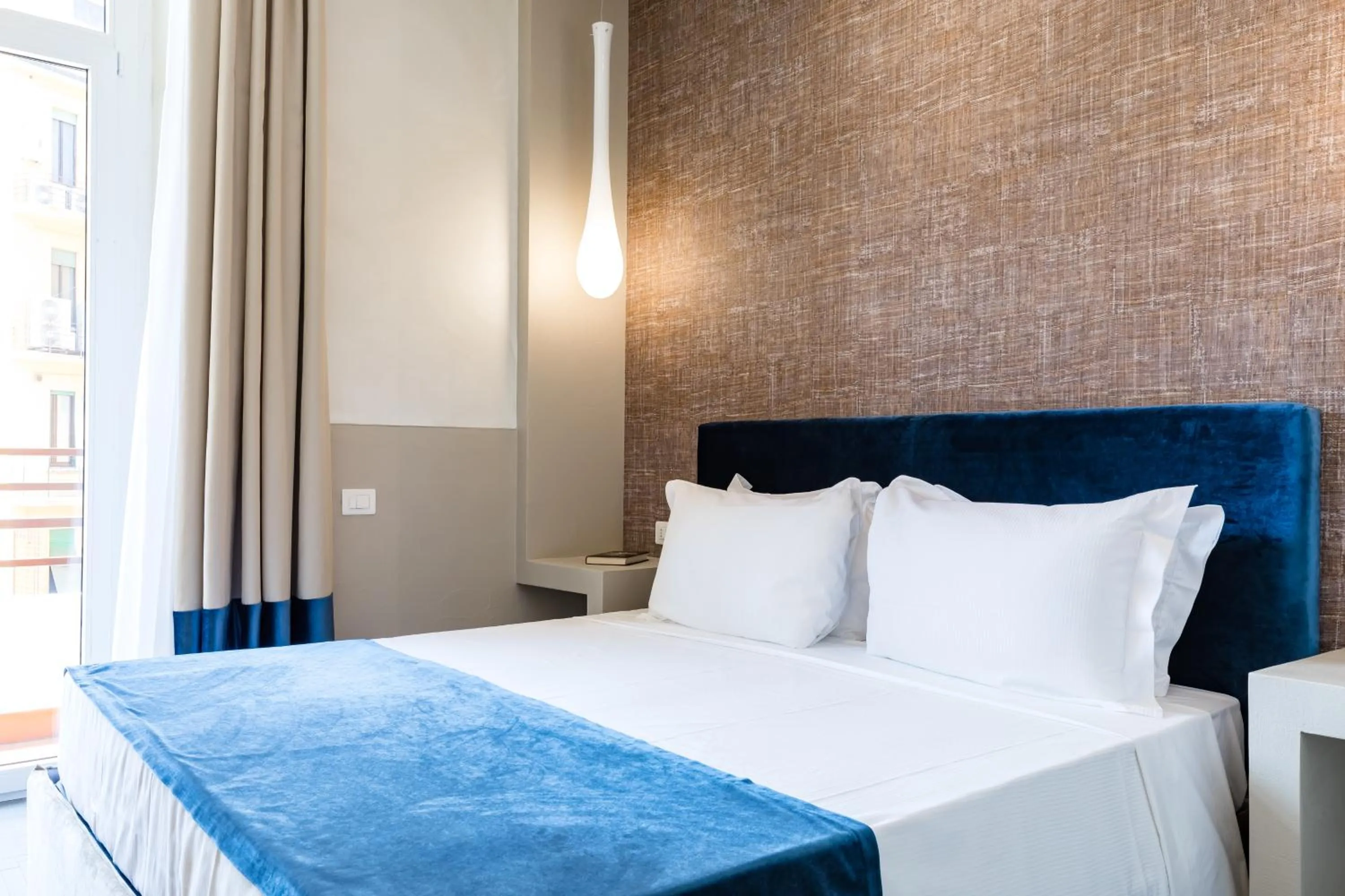 Bed in A World Aparts - Barberini Boutique Hotel