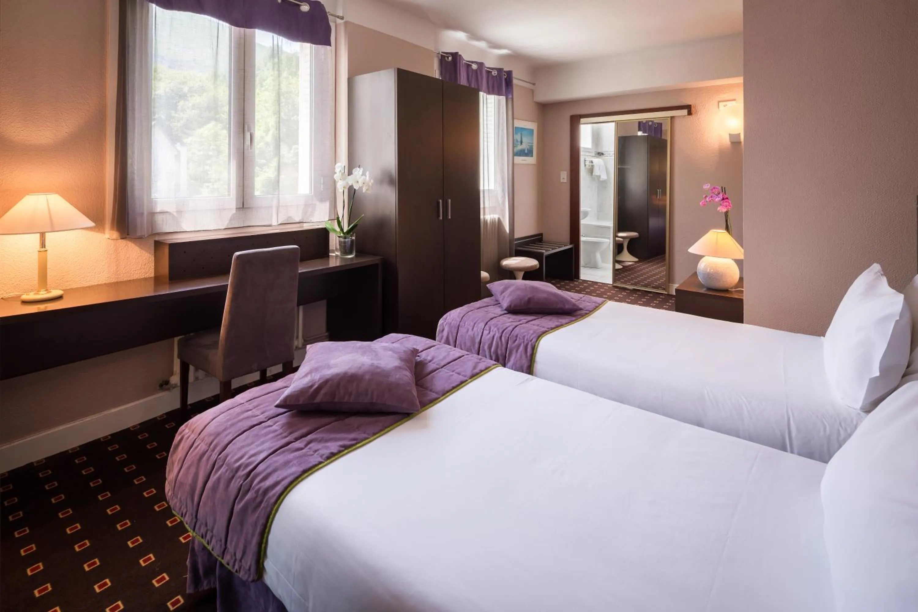 Photo of the whole room, Bed in Hôtel Christina Lourdes