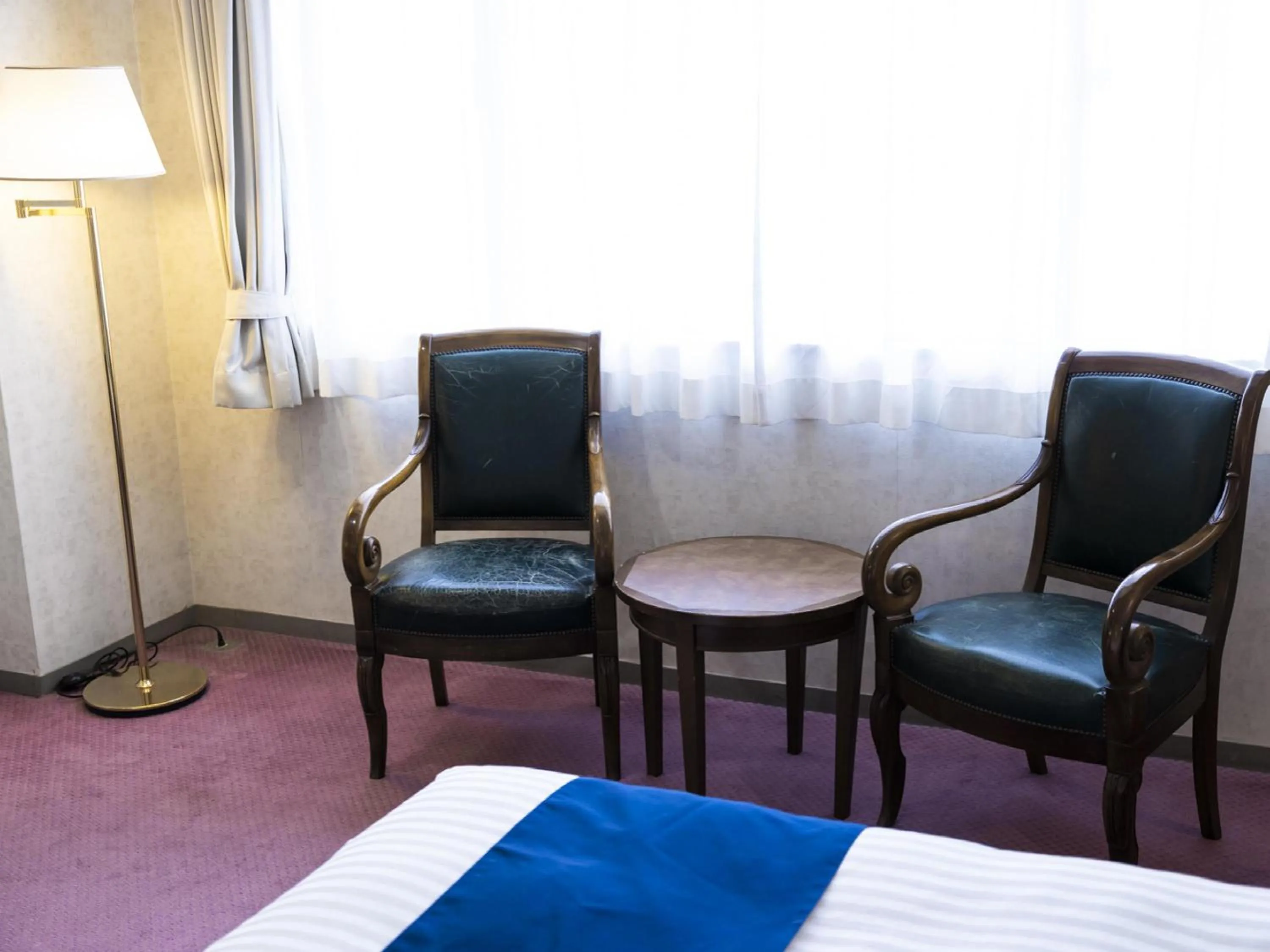 Photo of the whole room in Ariston Hotel Kobe