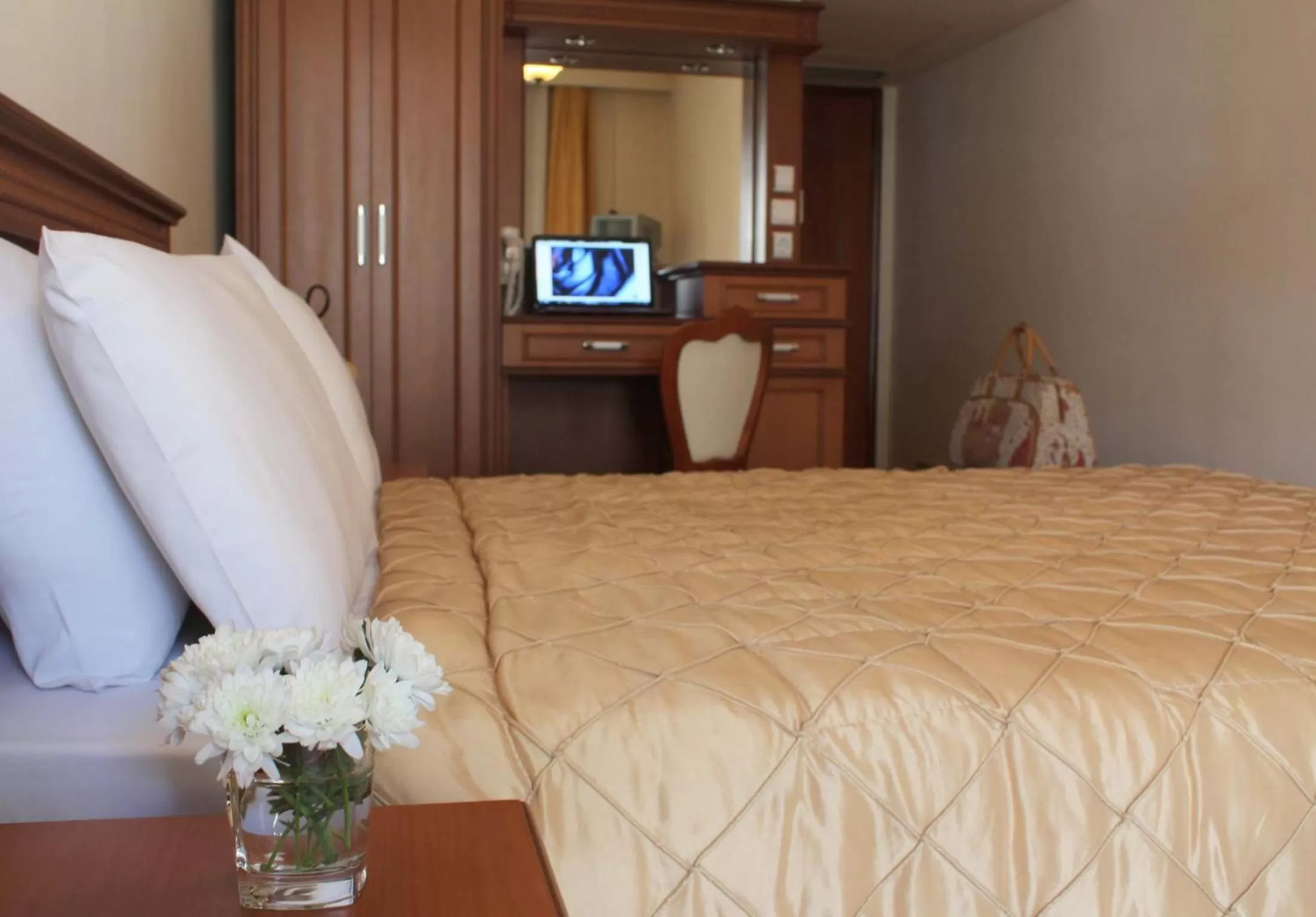 Bed in Famissi Hotel